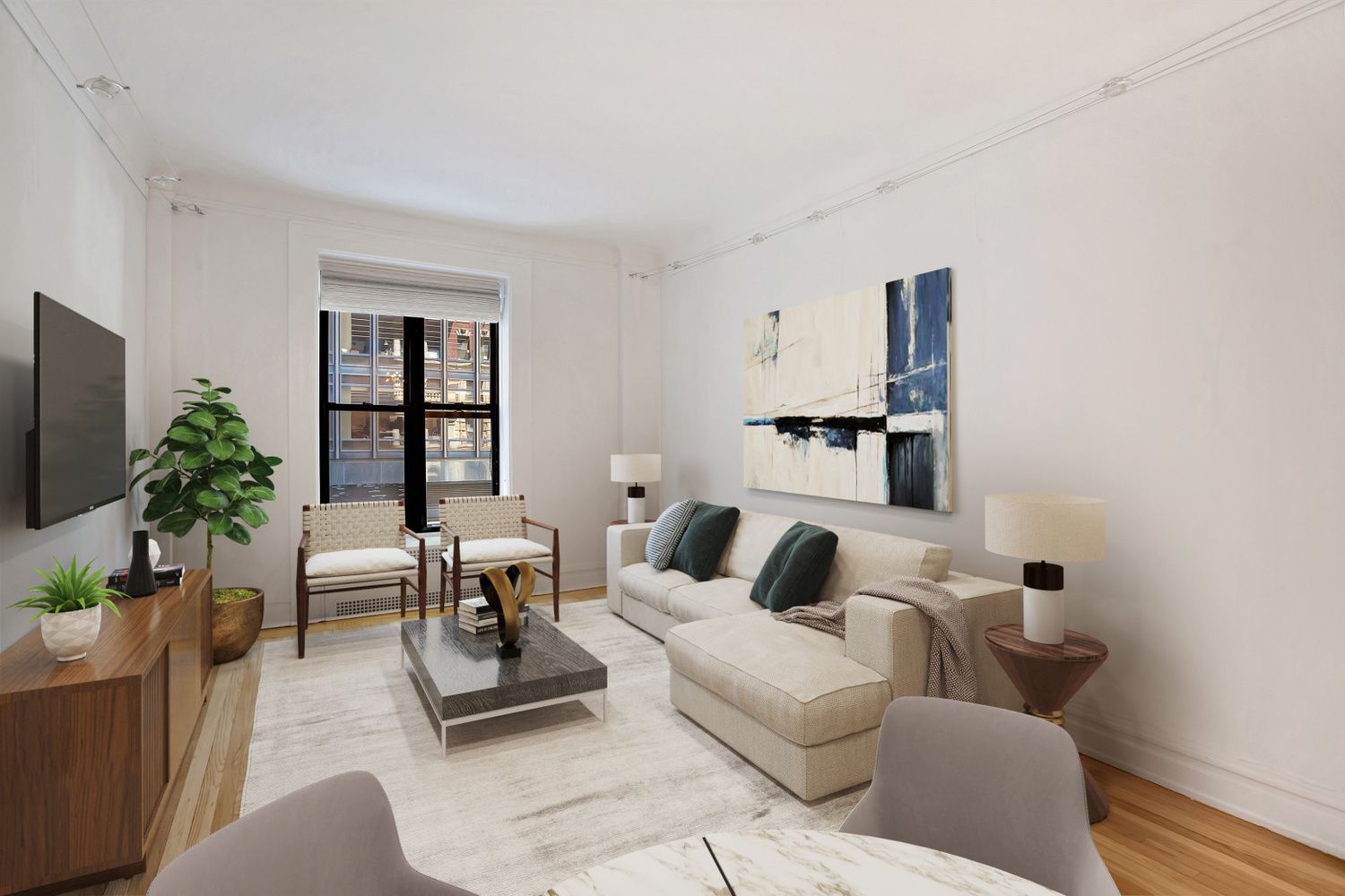 a living room with furniture and a potted plant