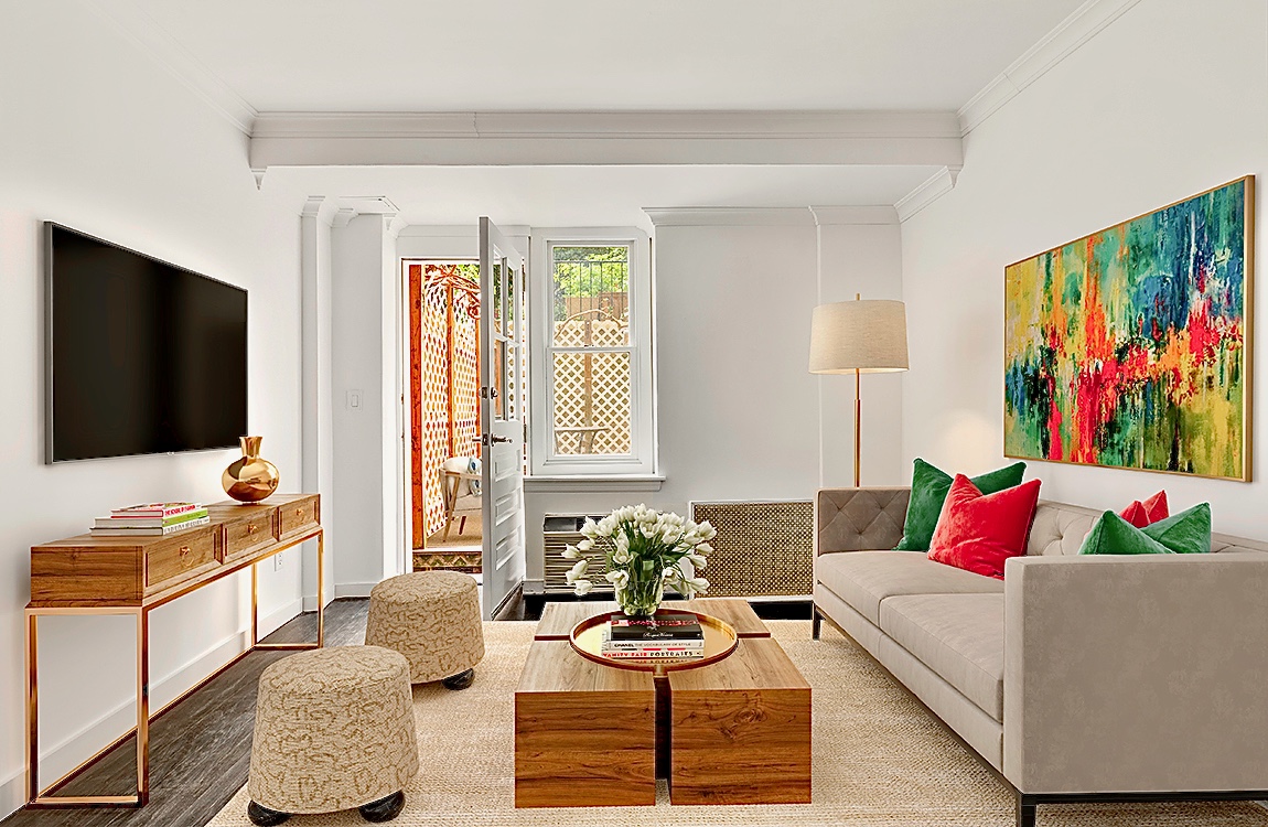 a living room with furniture and a flat screen tv