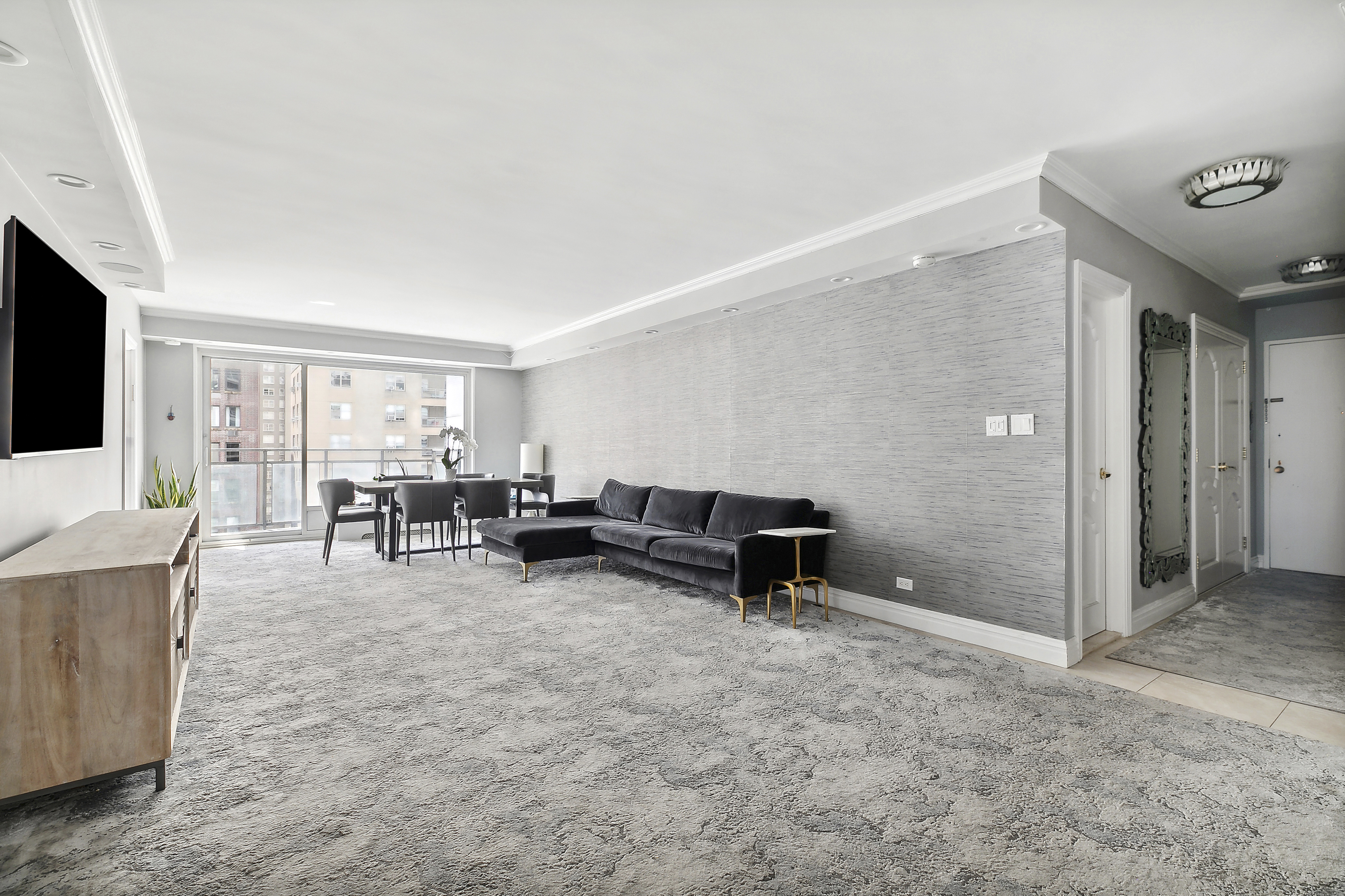 a view of livingroom with furniture and flat screen tv