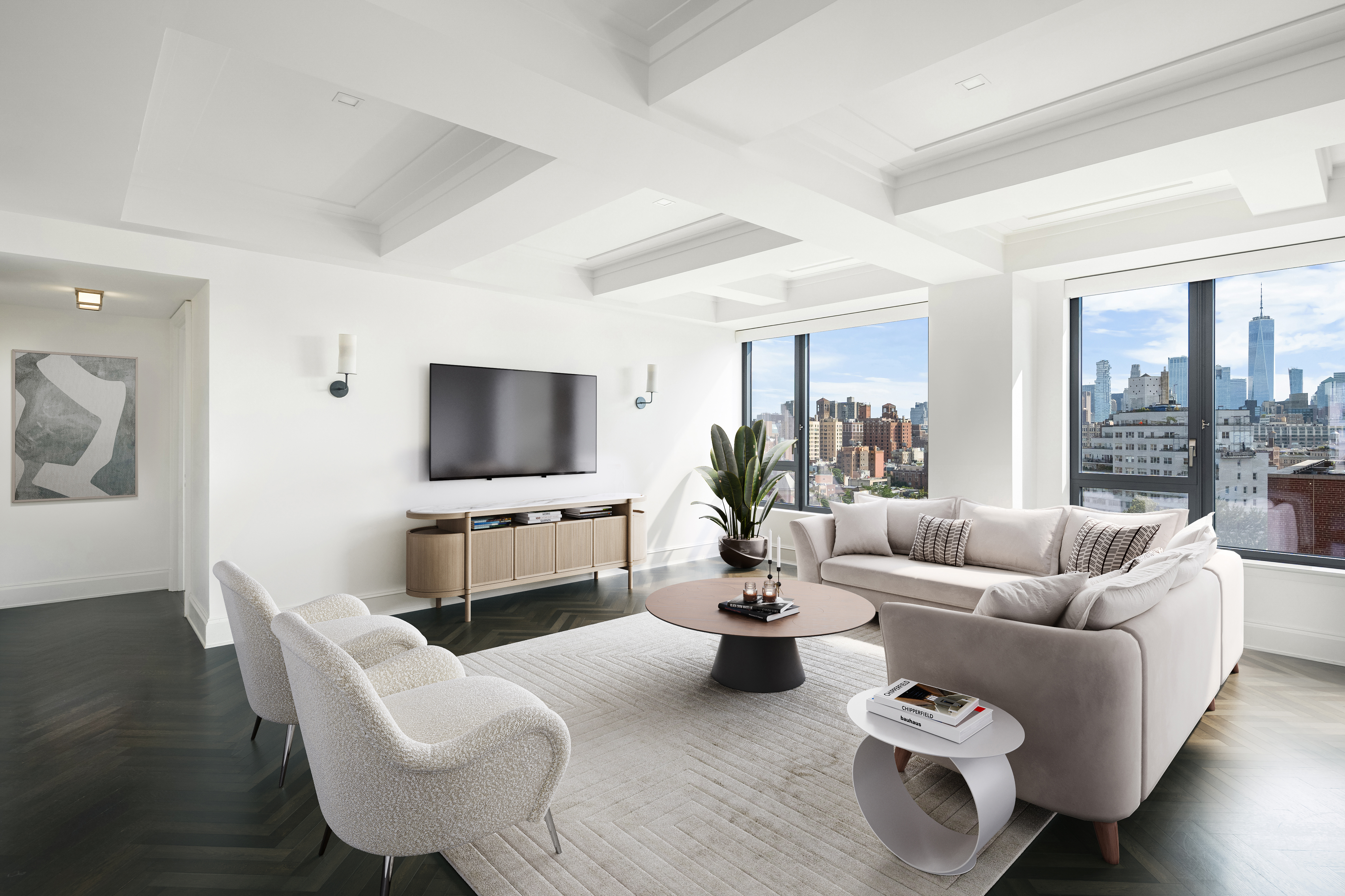 a living room with furniture and a flat screen tv