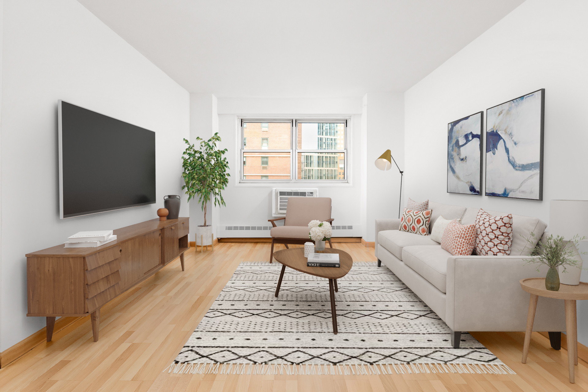 a living room with furniture and a flat screen tv