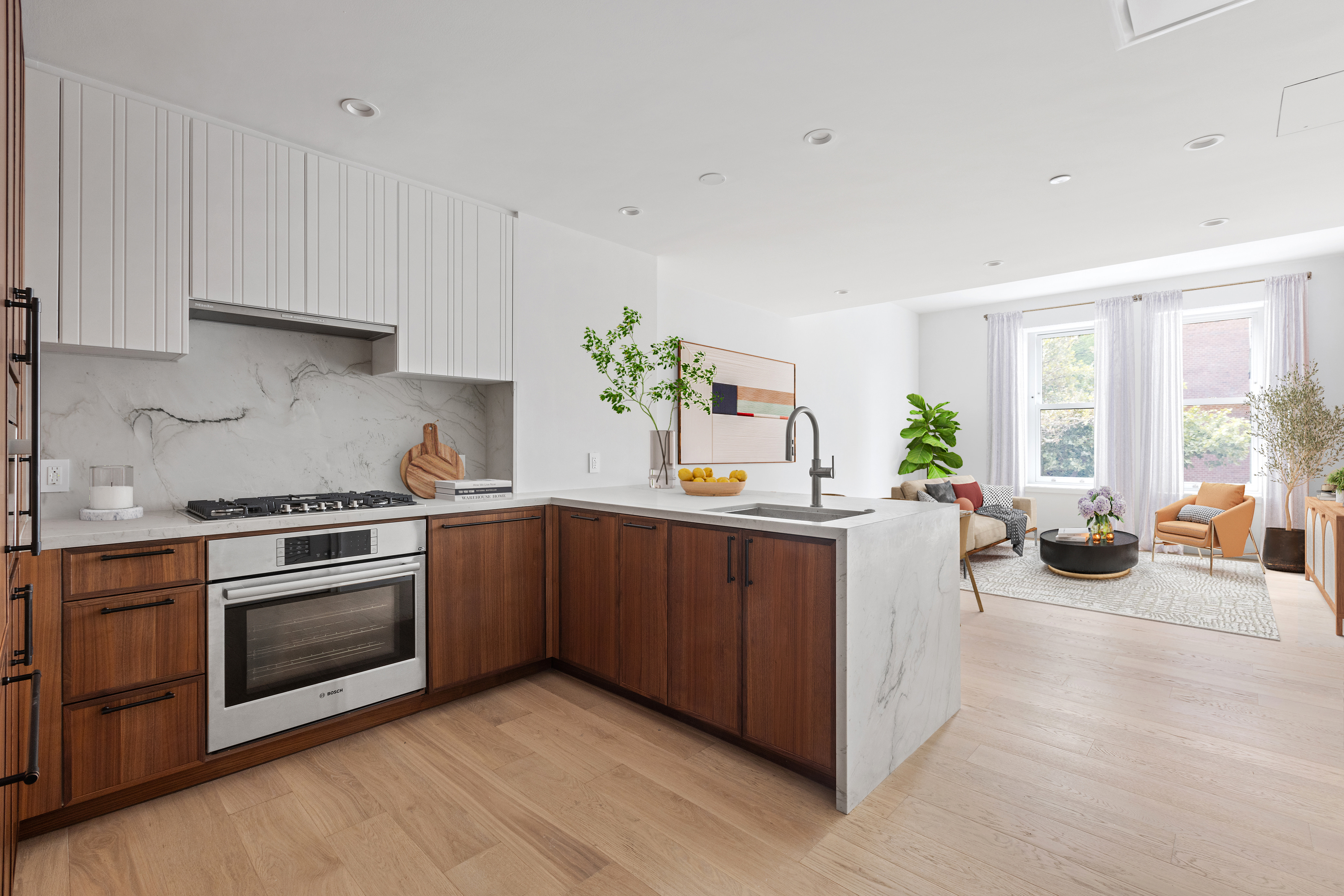 a kitchen with a stove top oven and cabinets