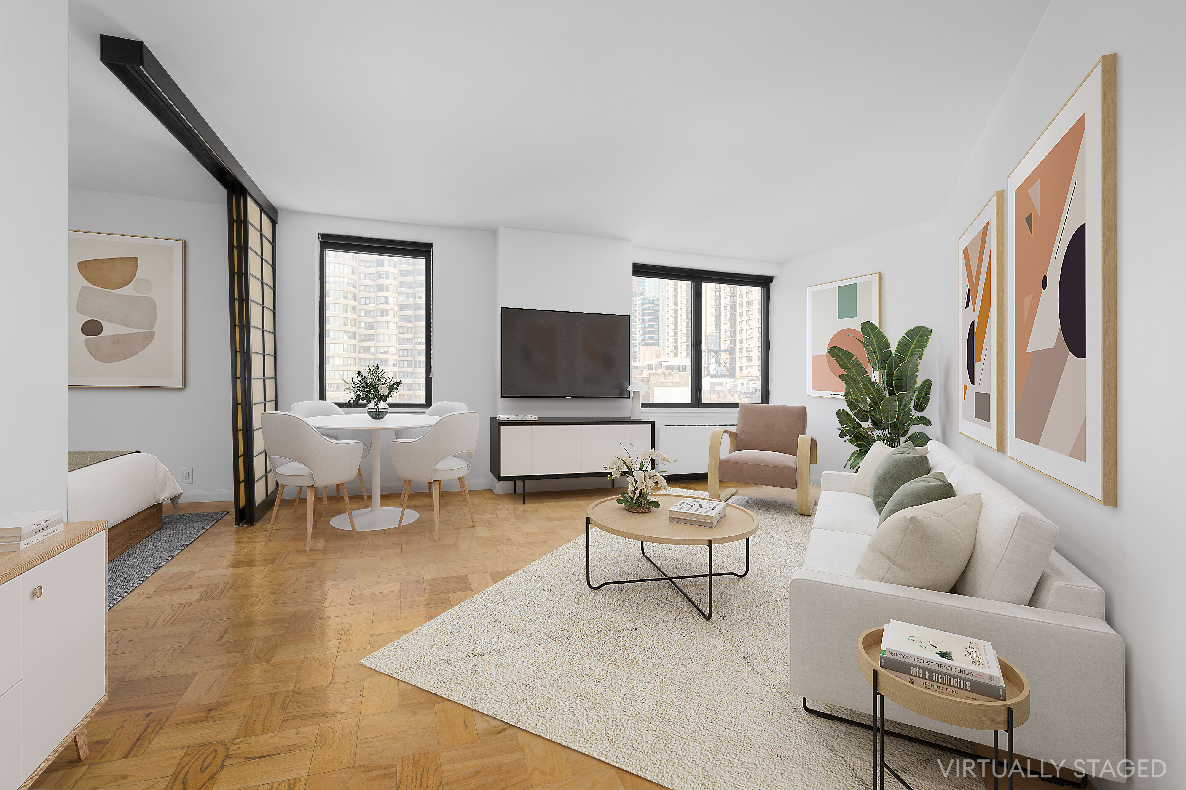 a living room with furniture and a flat screen tv