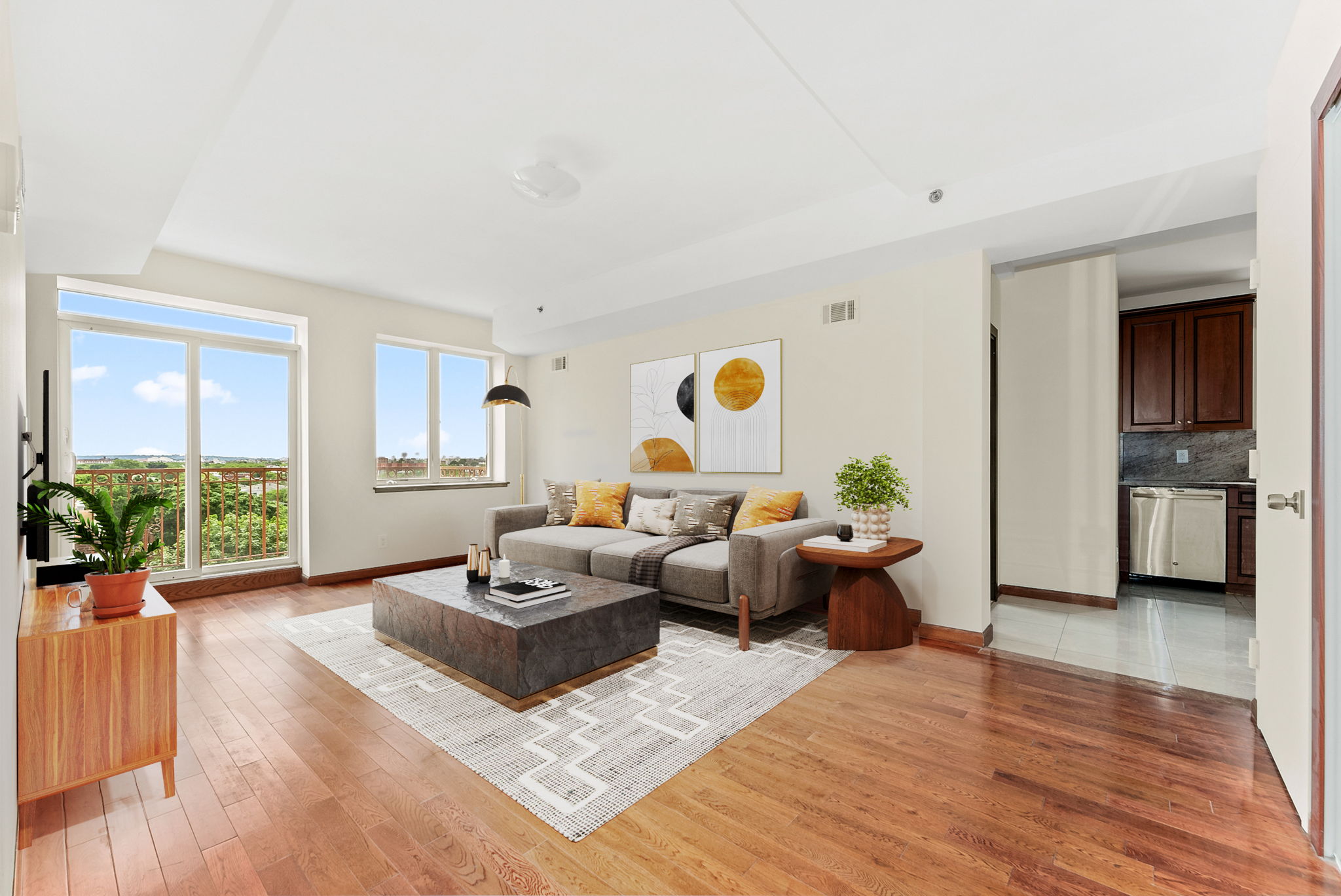 a living room with furniture and a large window