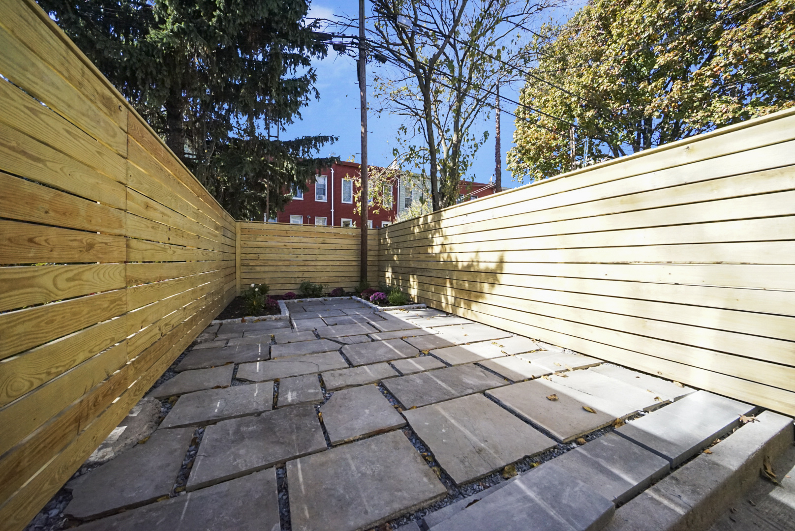 a view of a pathway with a house