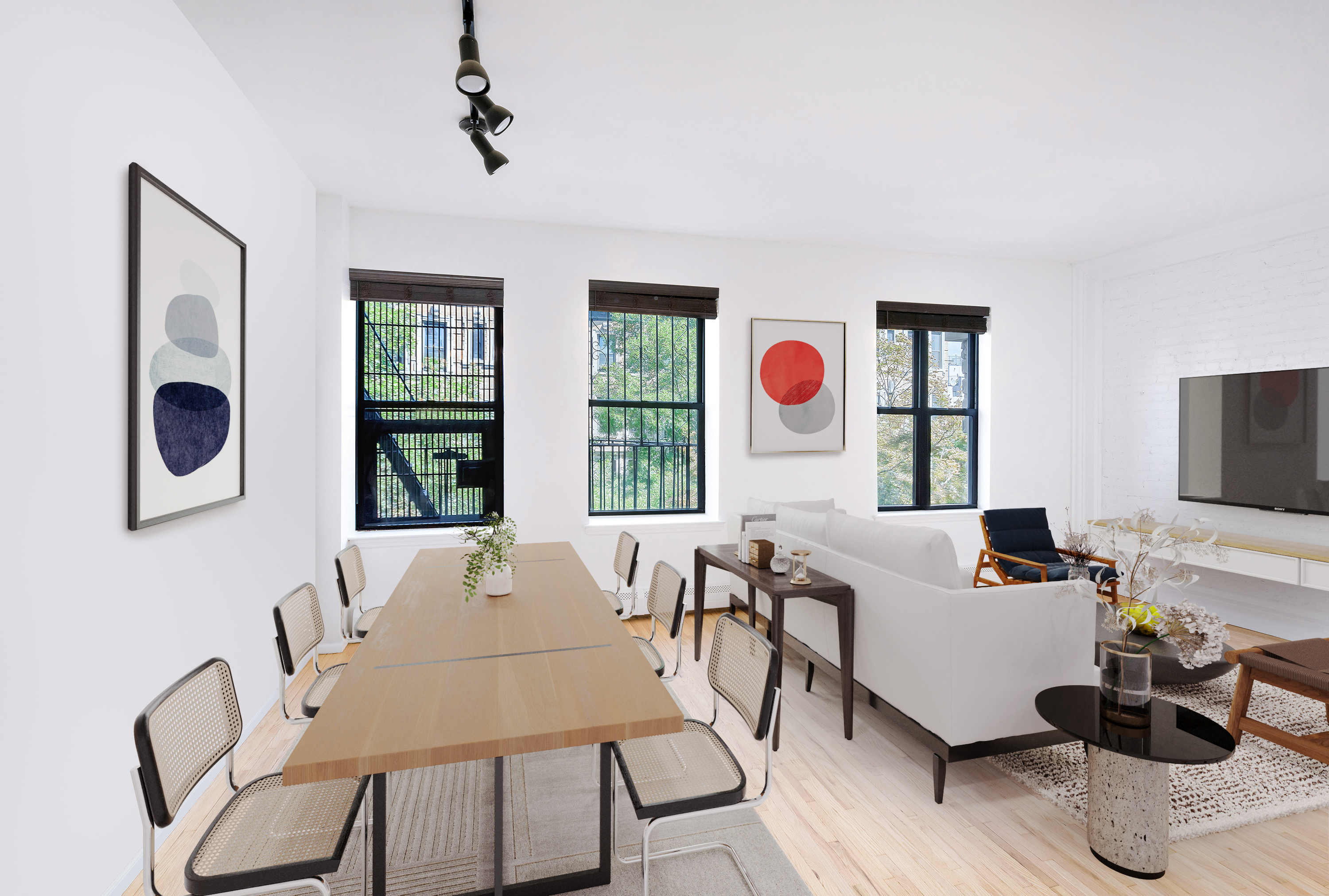 a living room with furniture and a flat screen tv