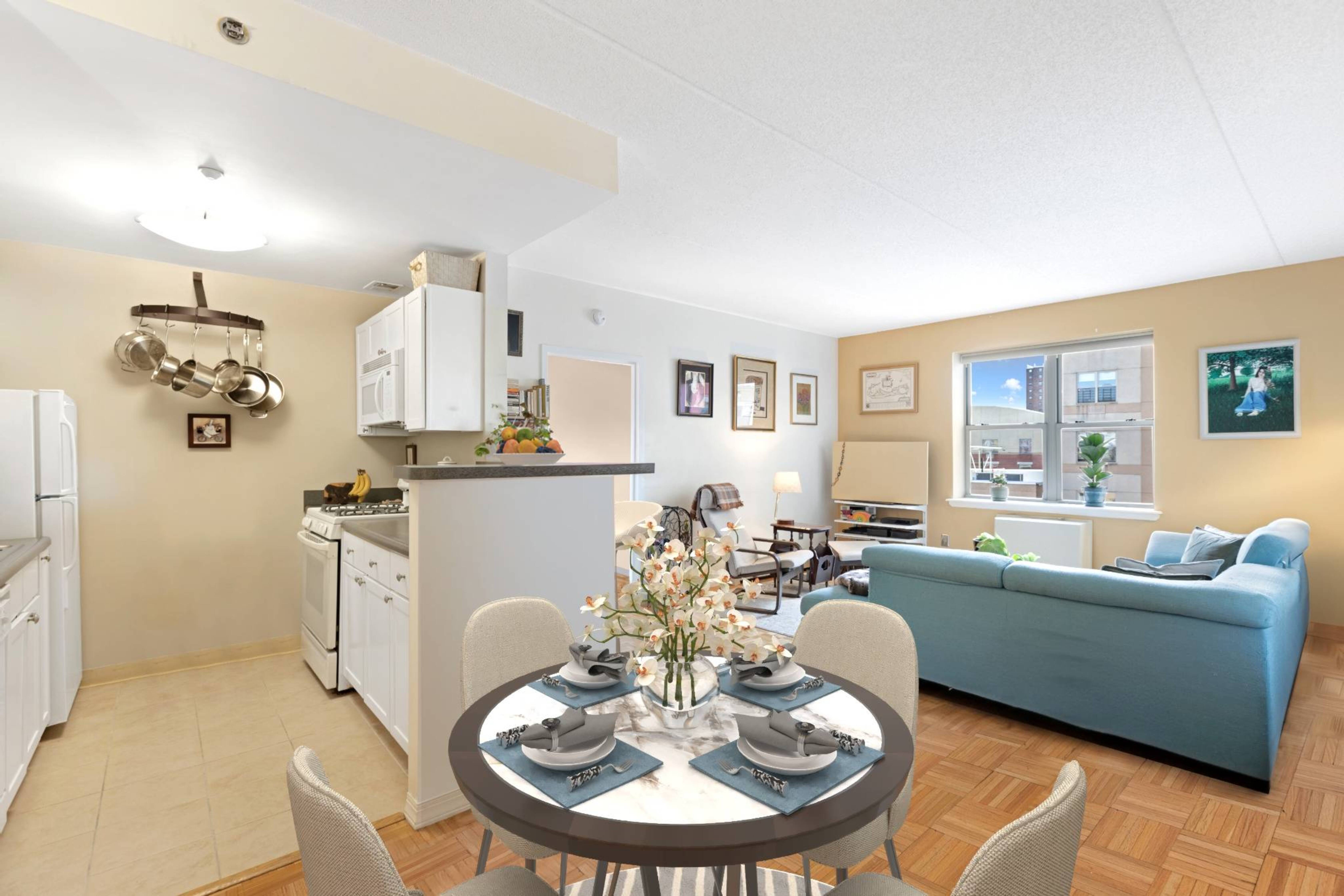 a living room with furniture a chandelier and a dining table