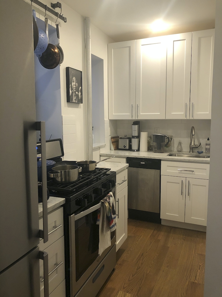 a kitchen with a stove and a sink