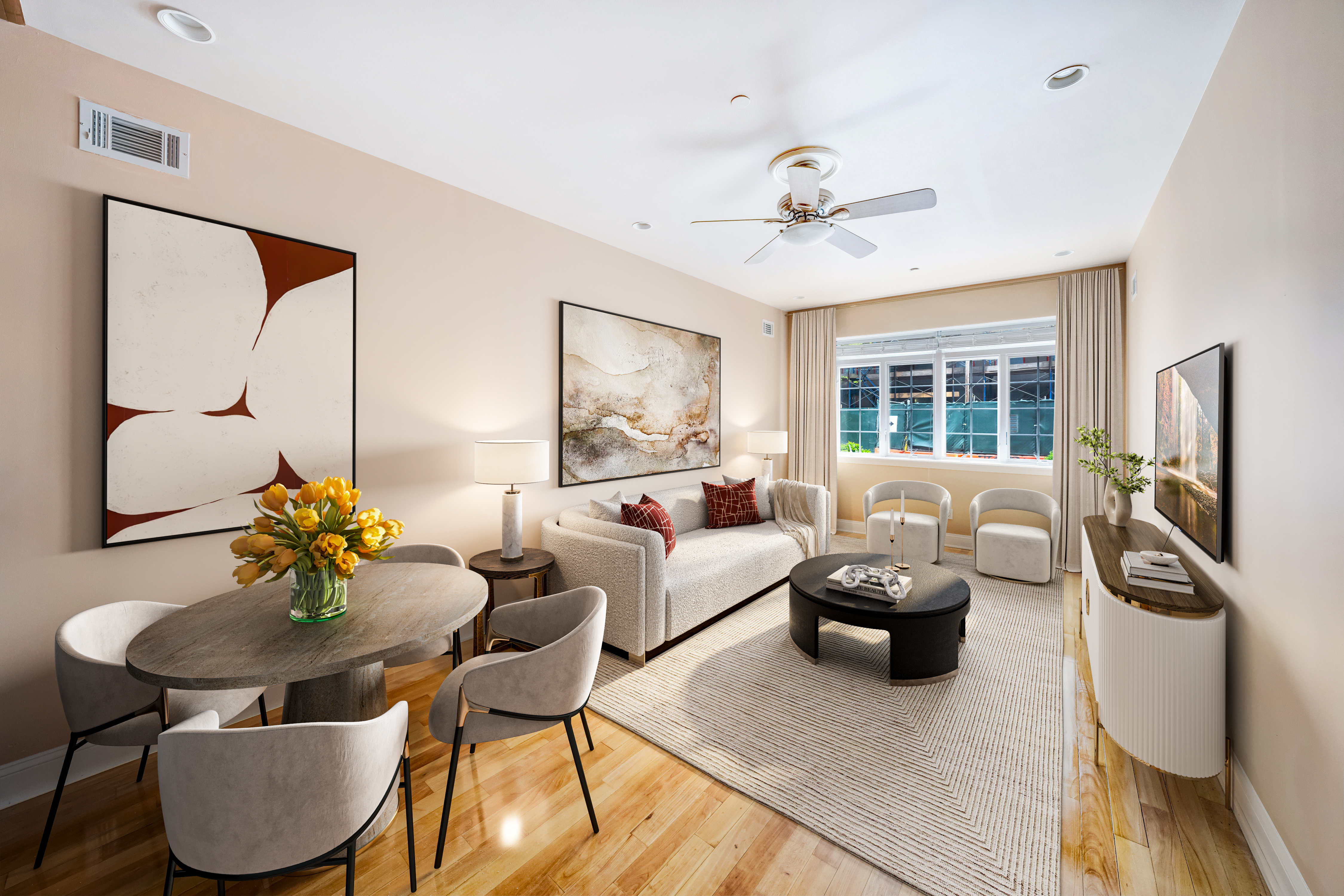 a living room with furniture and a chandelier