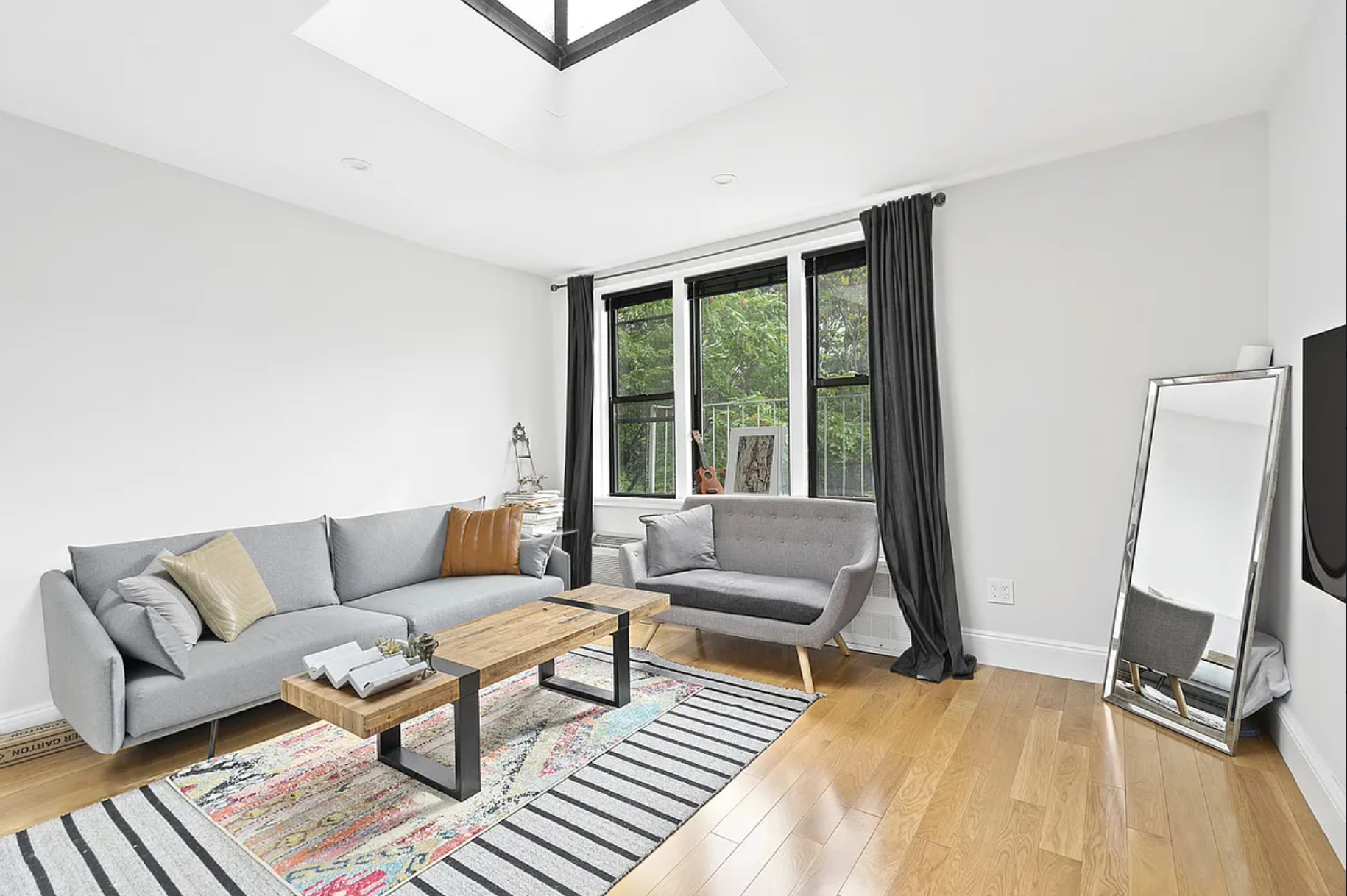 a living room with furniture and a couch