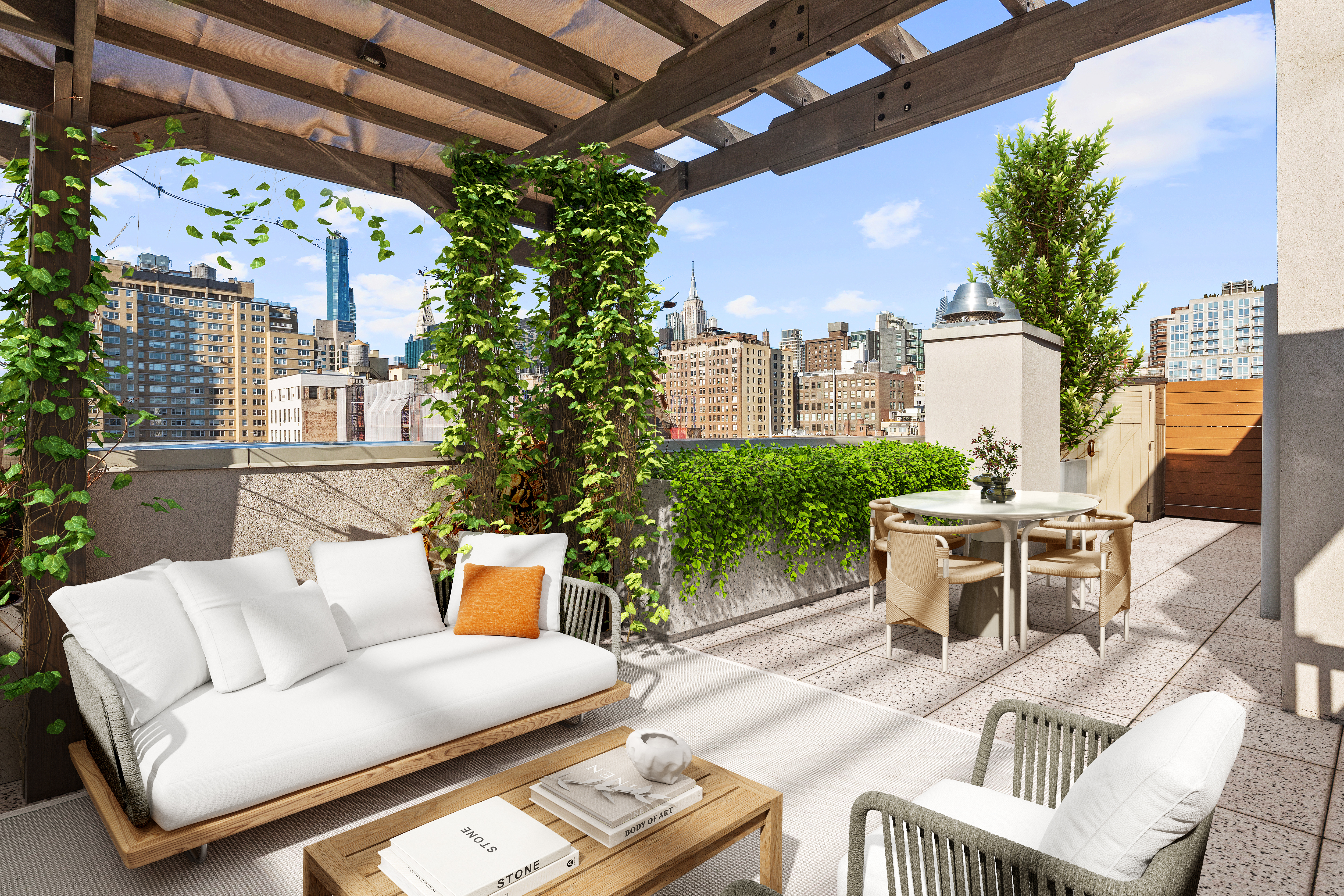 a view of a patio with couches and potted plants