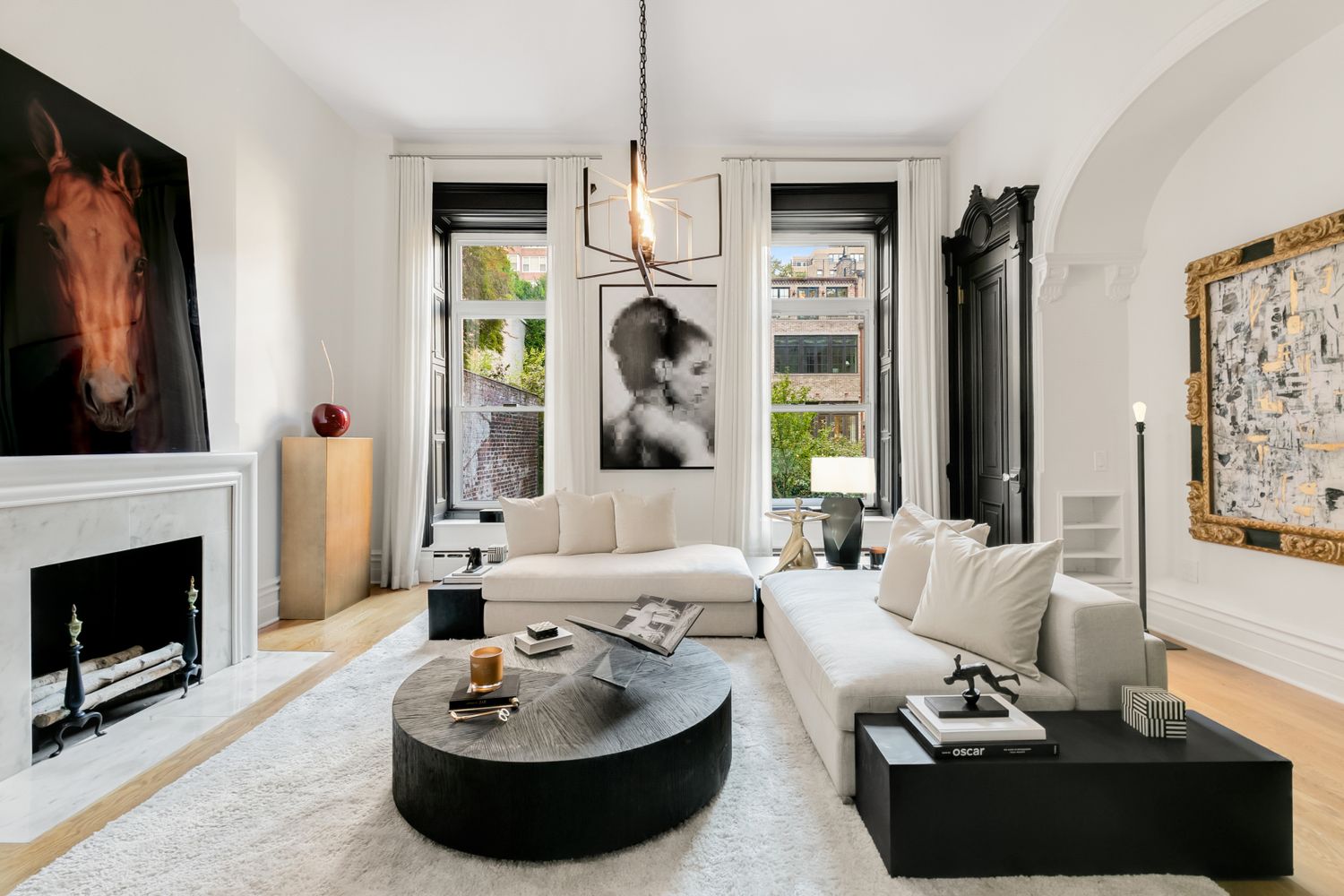 a living room with furniture fireplace and flat screen tv