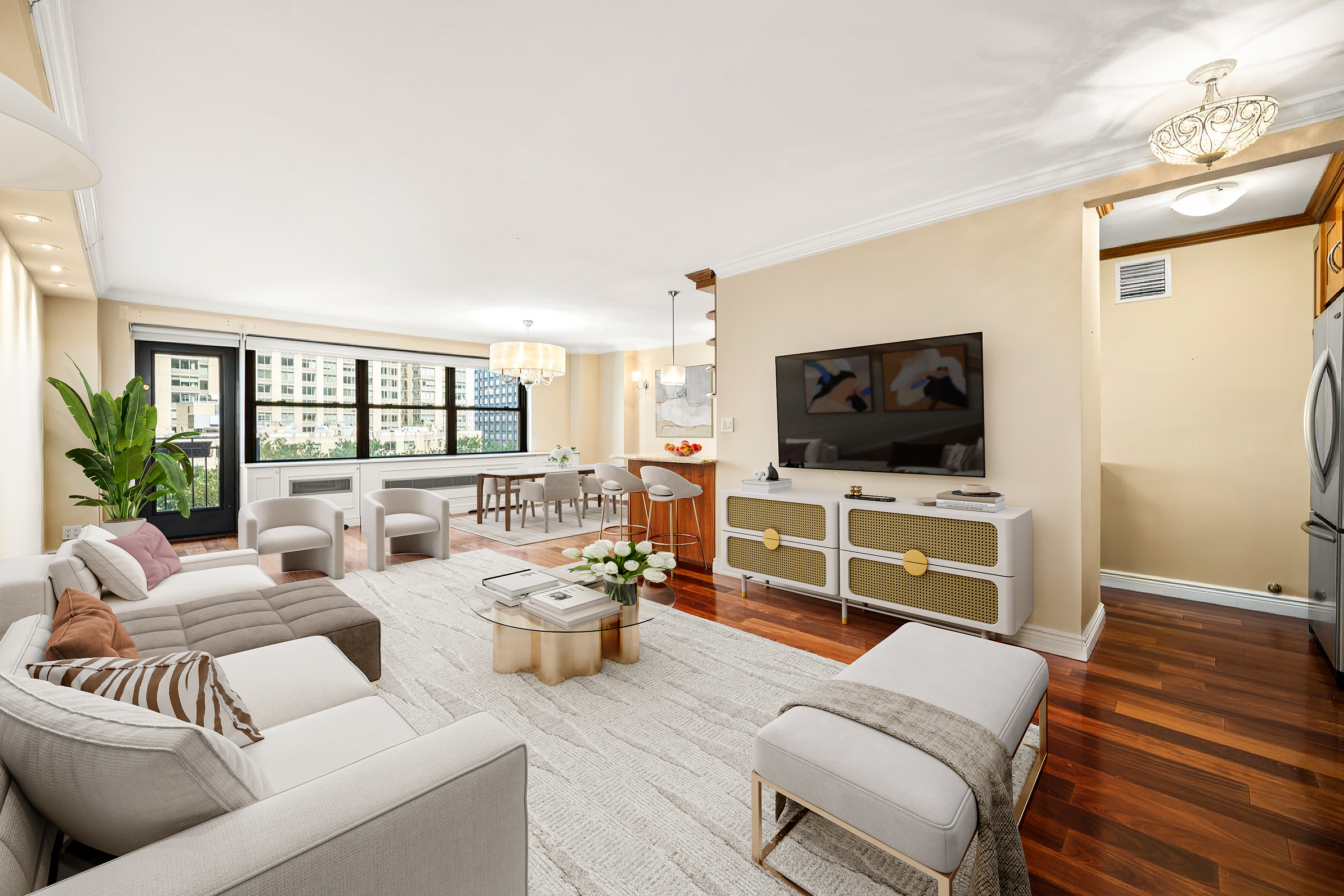 a living room with furniture and a flat screen tv