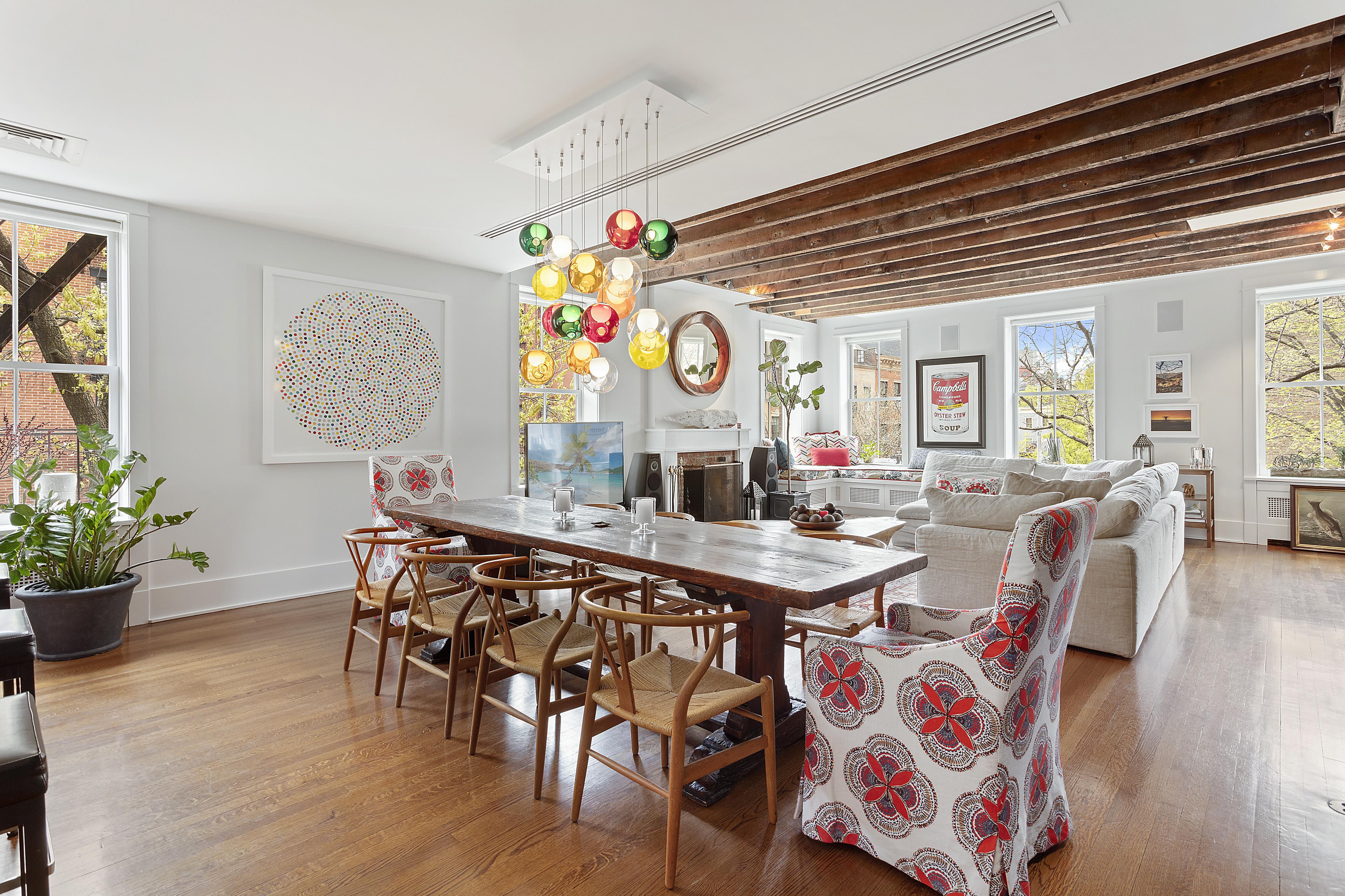 a view of a dining area with furniture and wooden floor