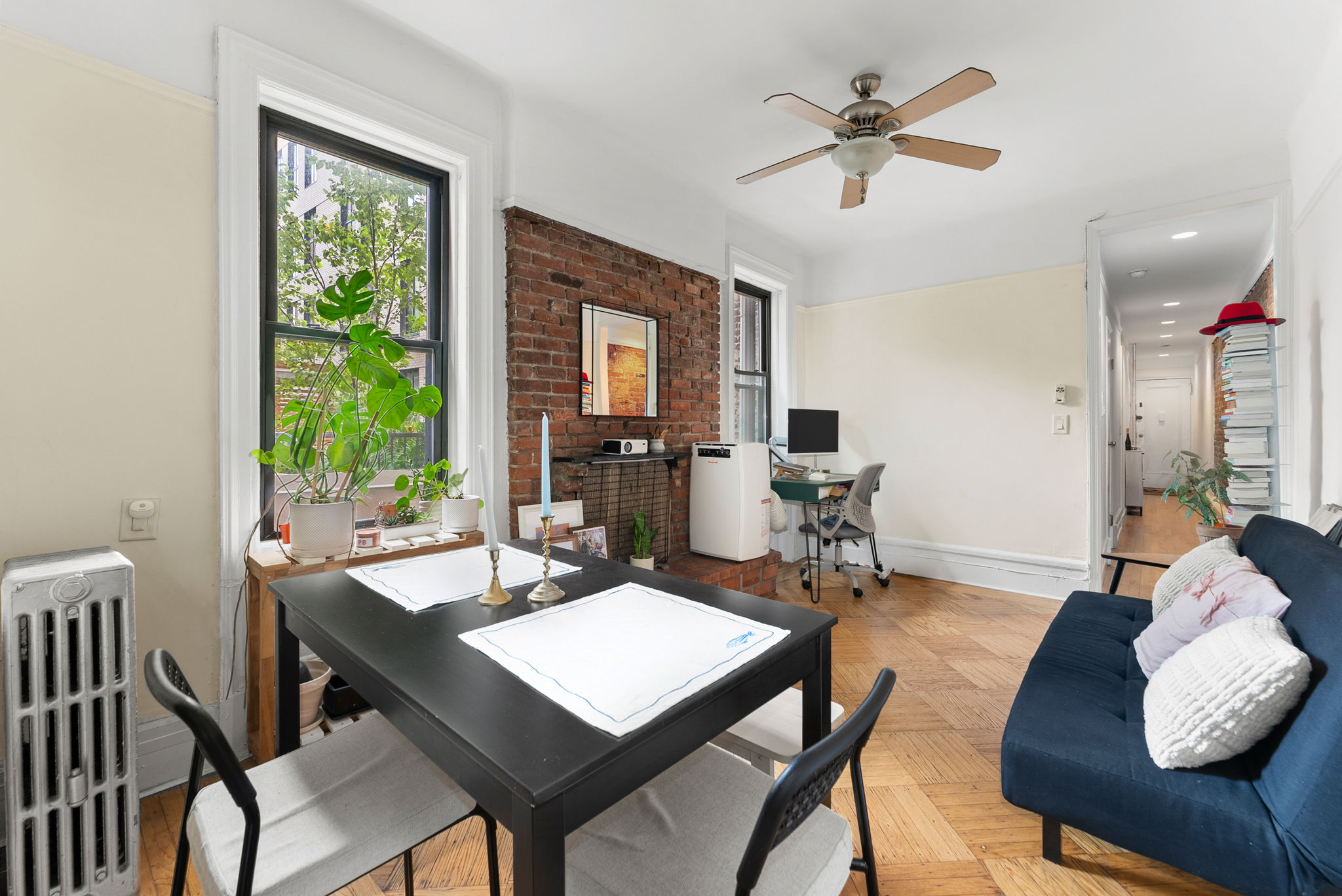 a view of a dining room with furniture window and outside view