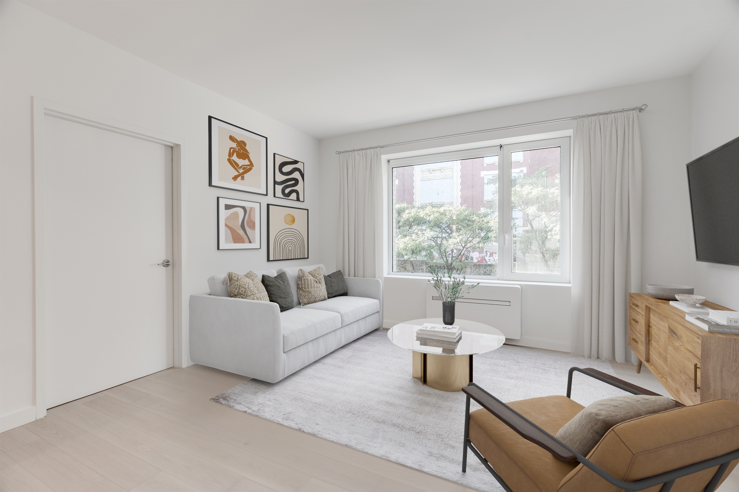 a living room with furniture and a flat screen tv