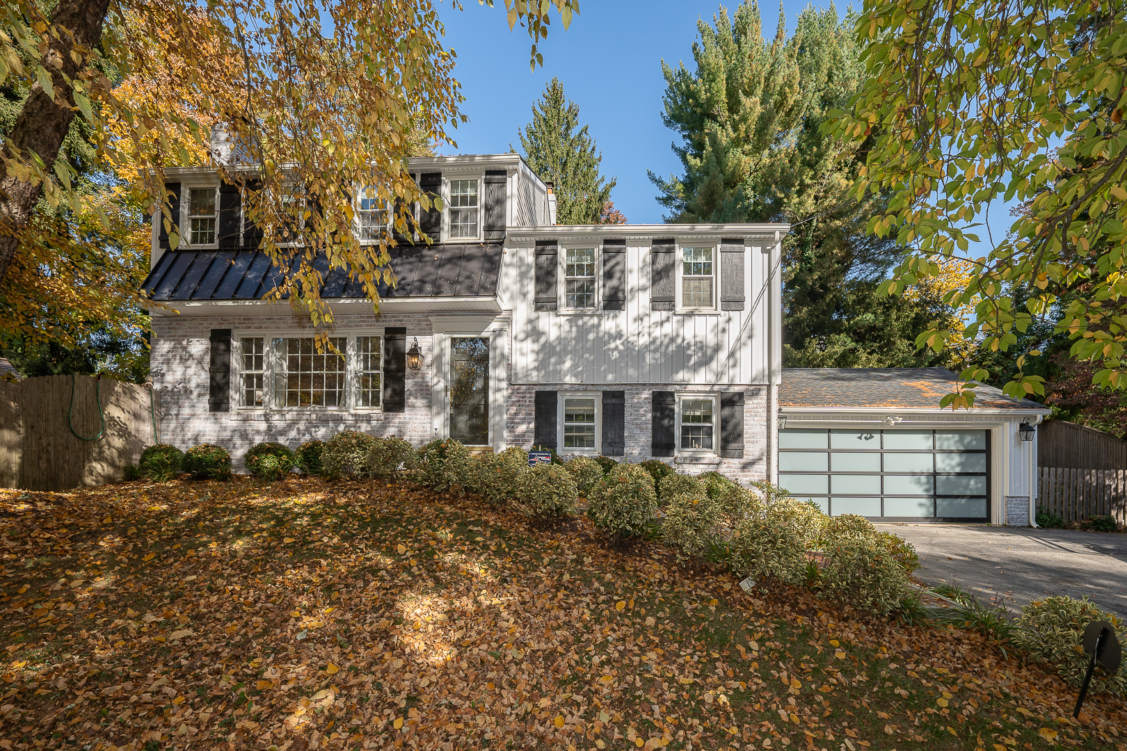 front view of a house with a garden