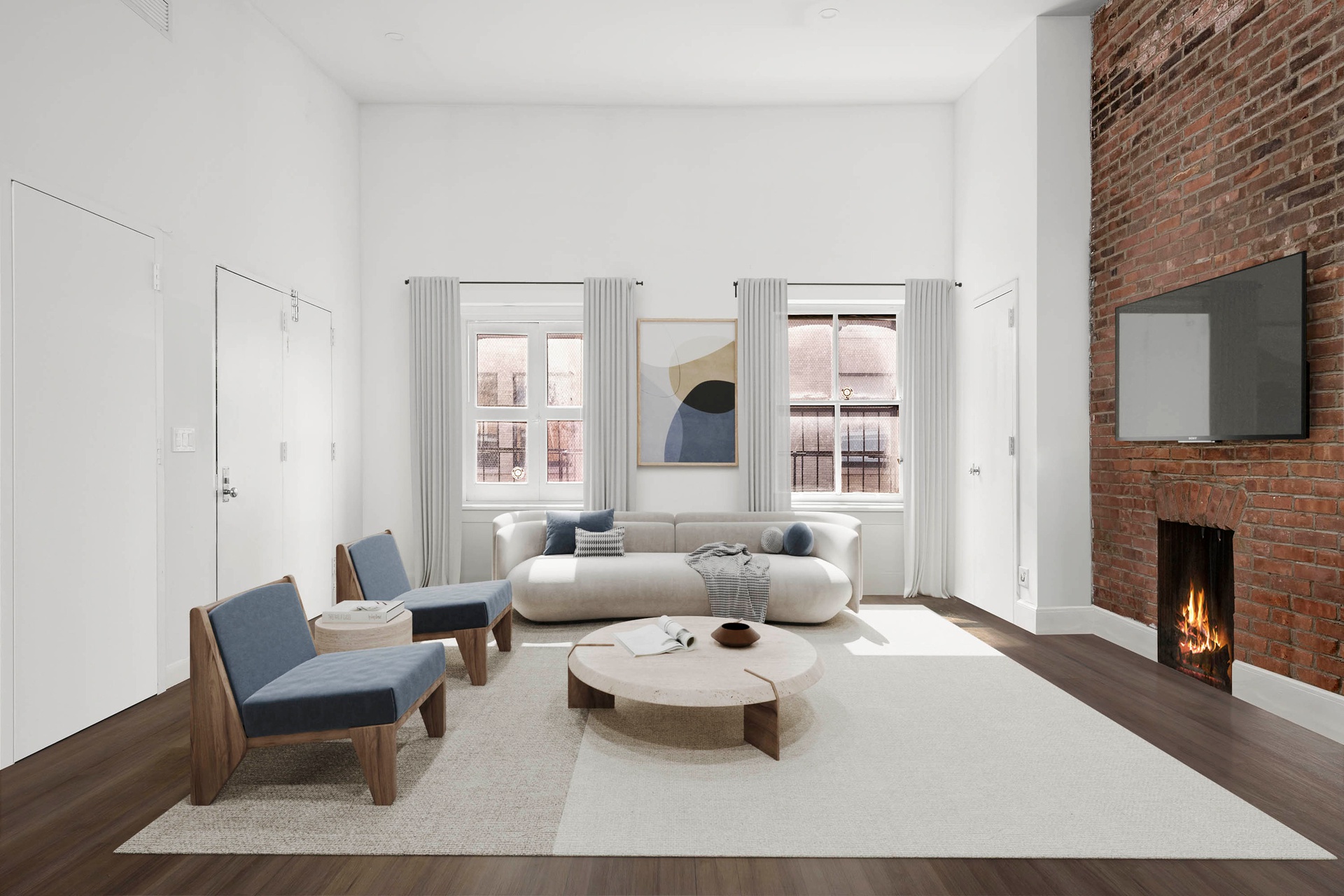 a living room with furniture large window and fireplace