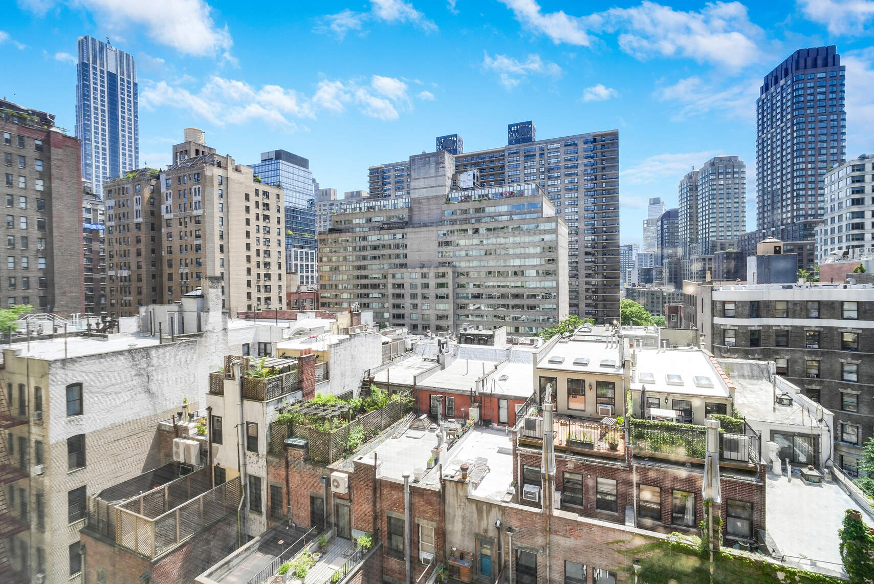 a view of city with tall buildings