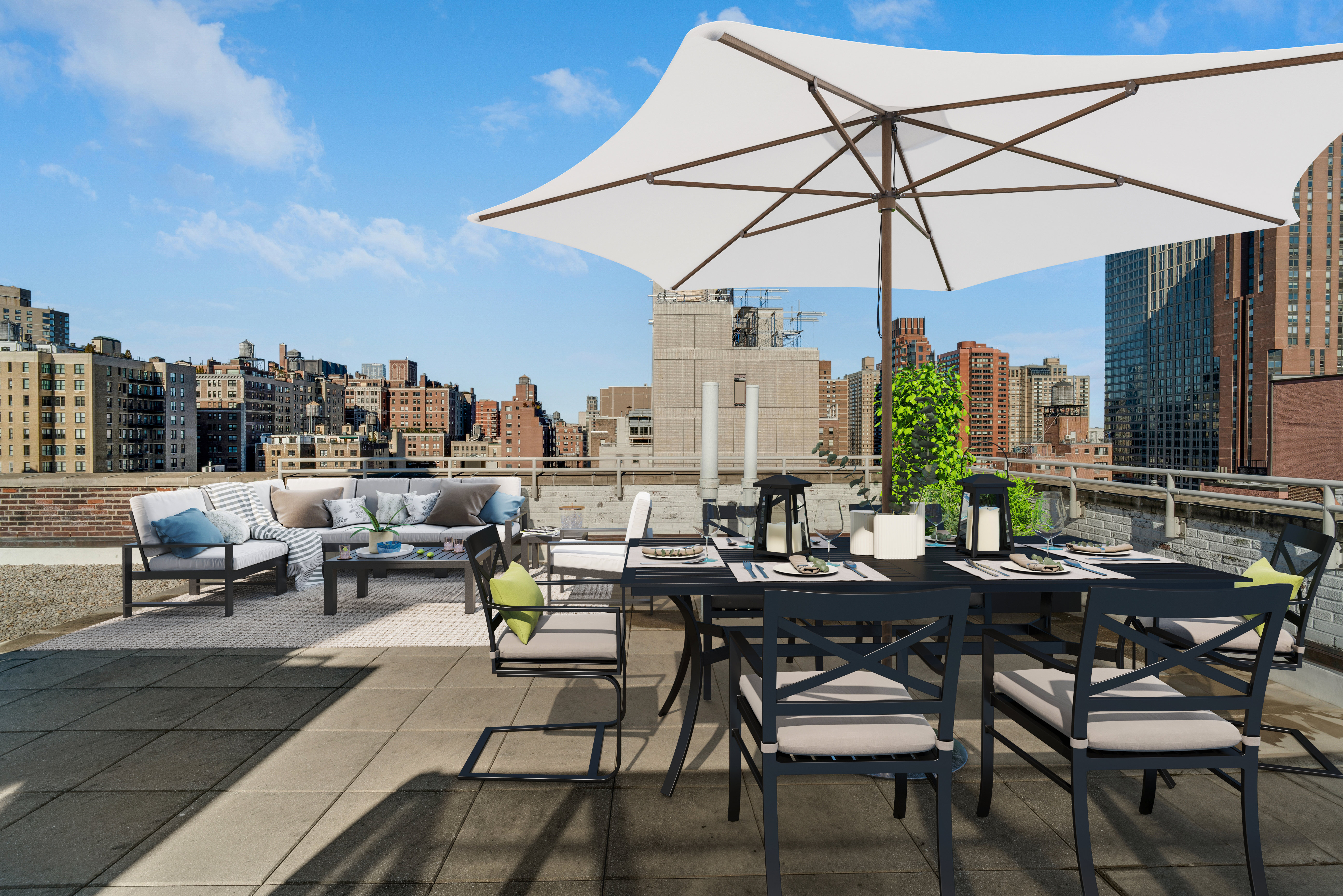 a view of a terrace with furniture and umbrella