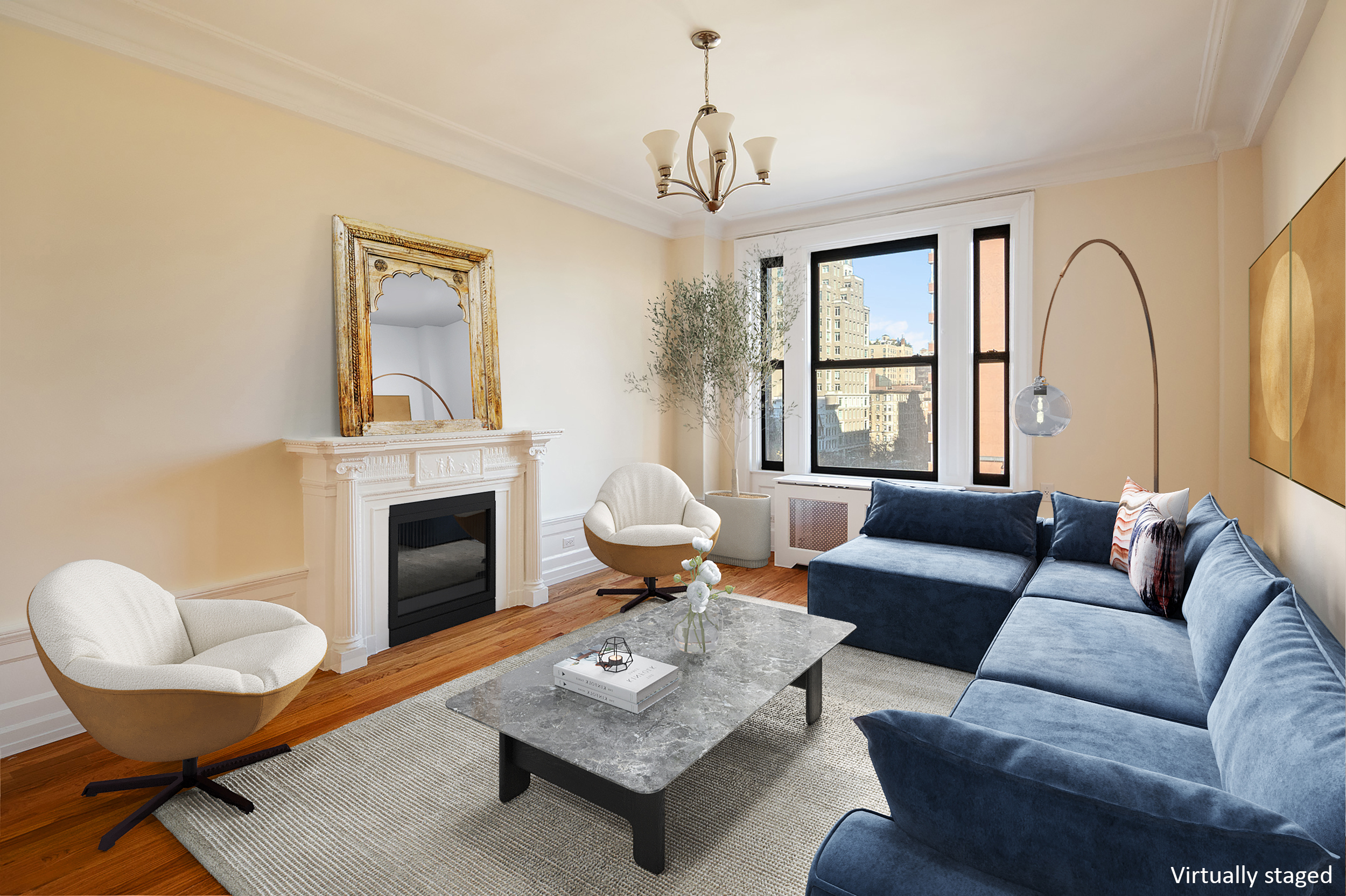 a living room with furniture a fireplace and a chandelier