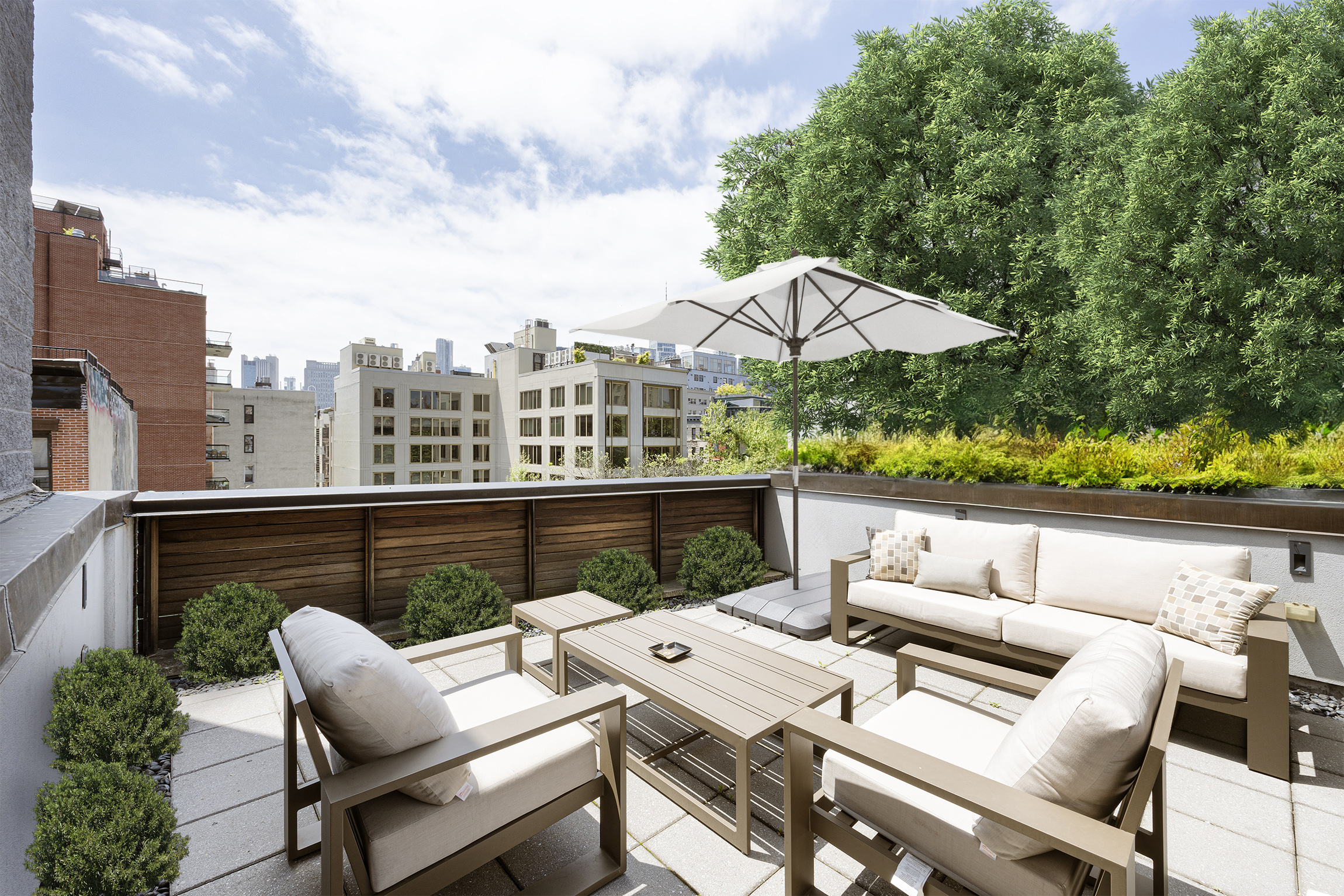 a view of balcony with furniture