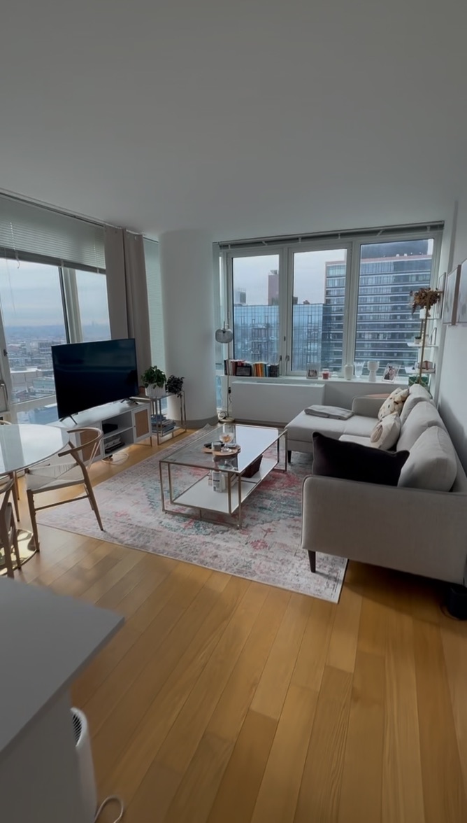 a living room with furniture and a table