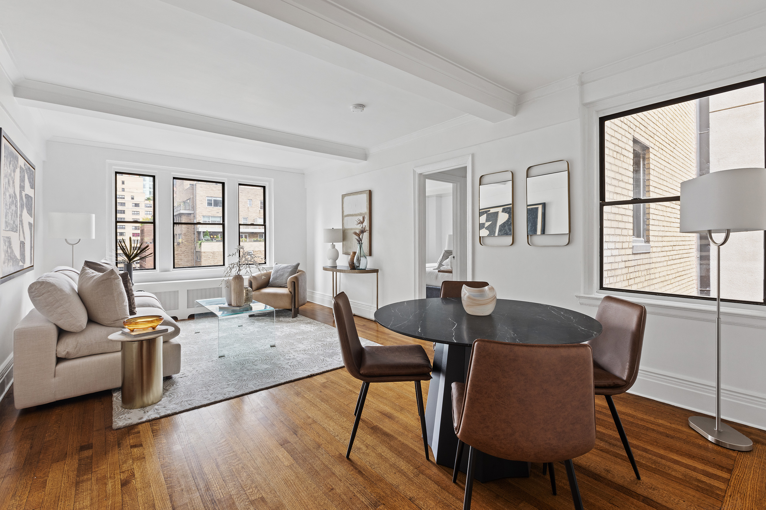 a living room with furniture and a window