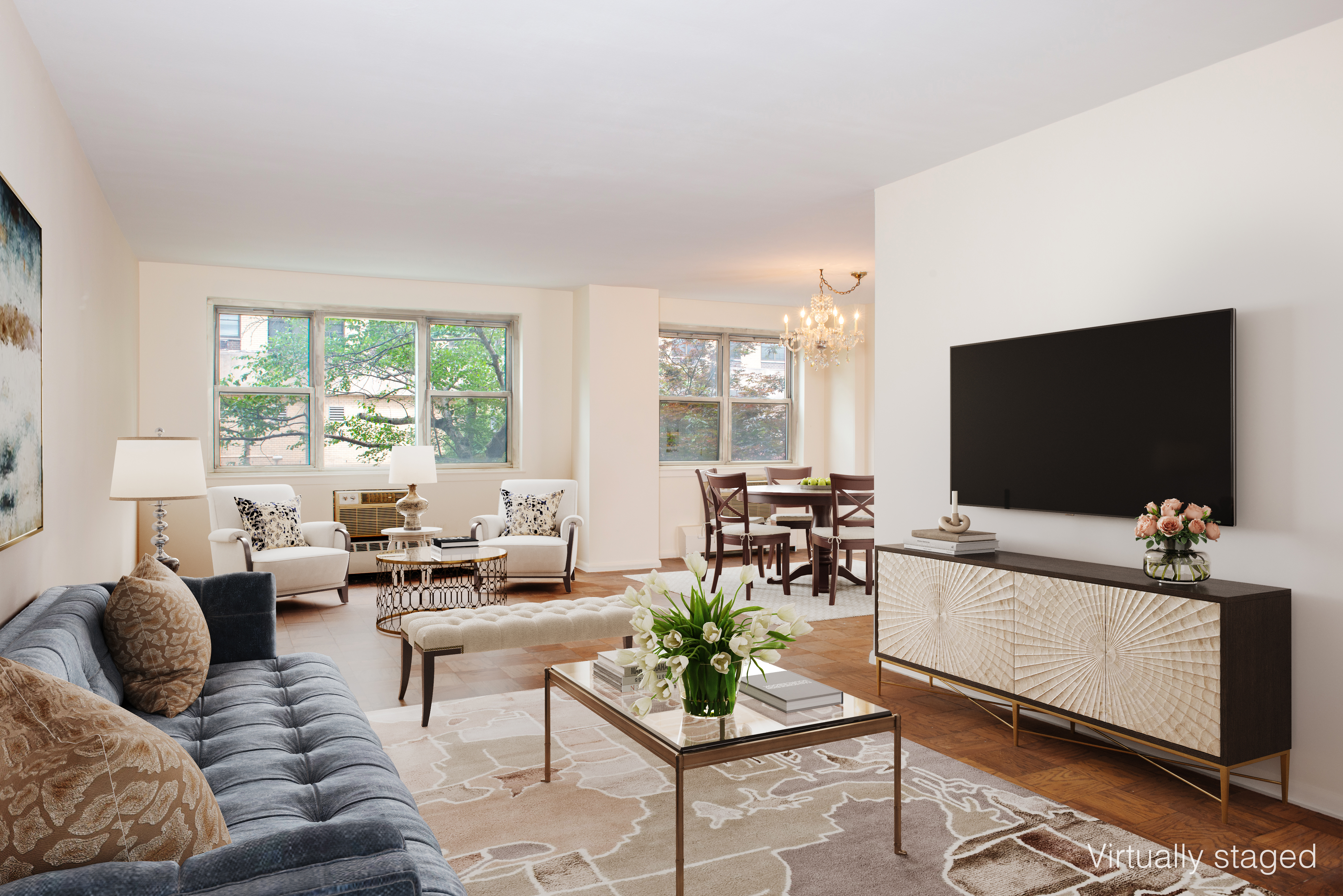 a living room with furniture and a flat screen tv