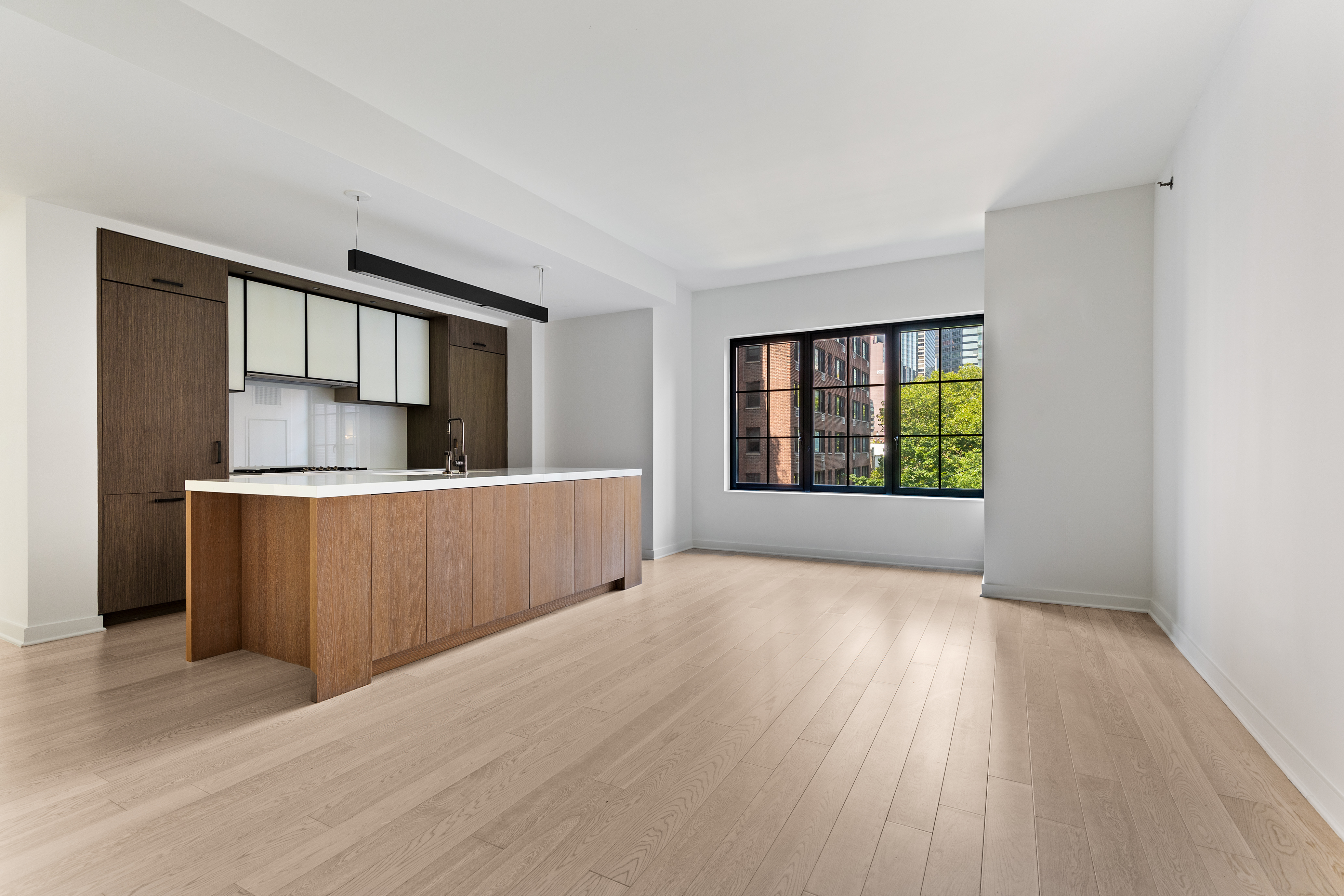 a view of a kitchen with furniture and a window