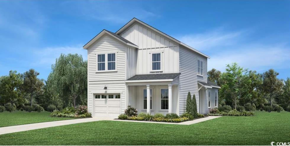 View of front of property featuring a garage and a