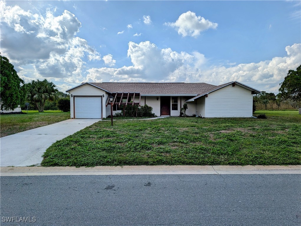 front view of a house with a yard