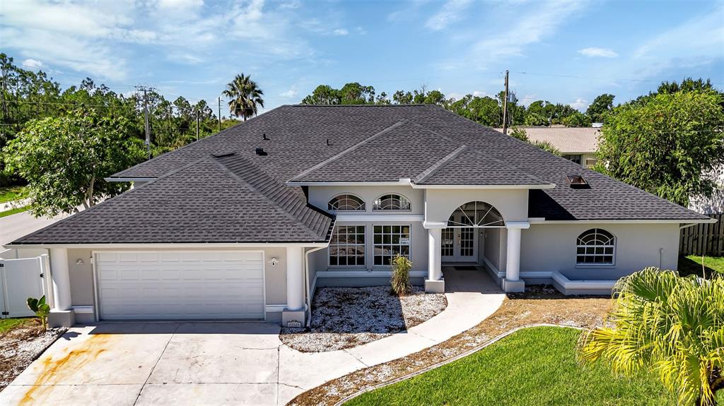 a front view of a house with a yard