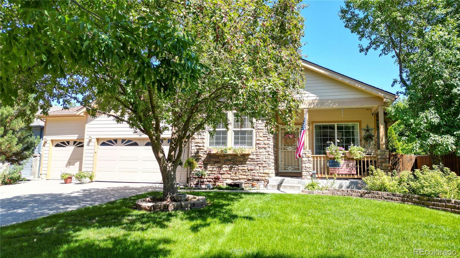 front view of a house with a yard