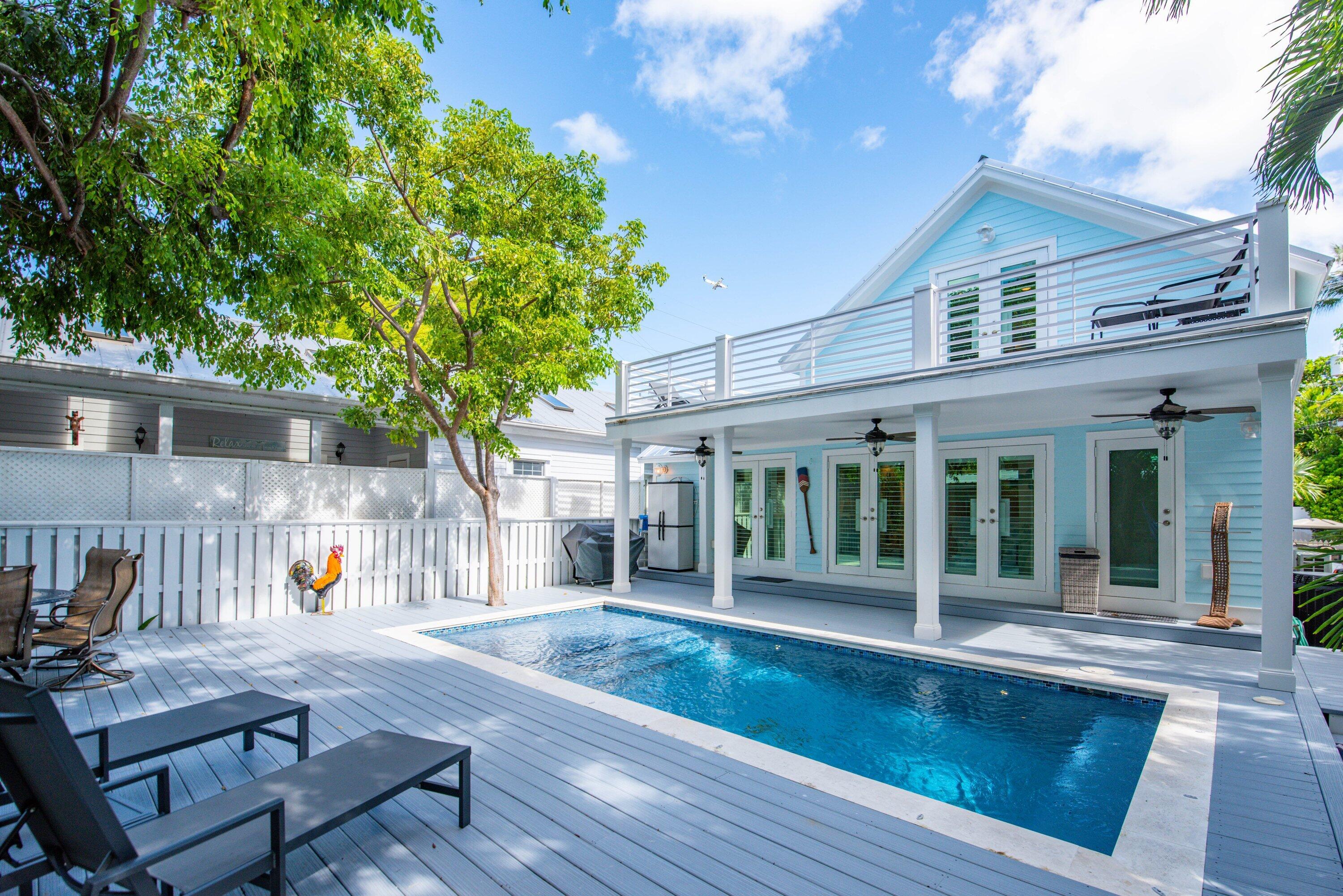 a view of a house with a swimming pool