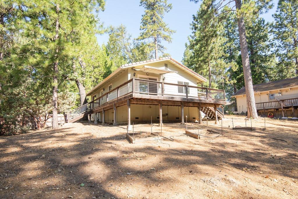 a house with trees in the background