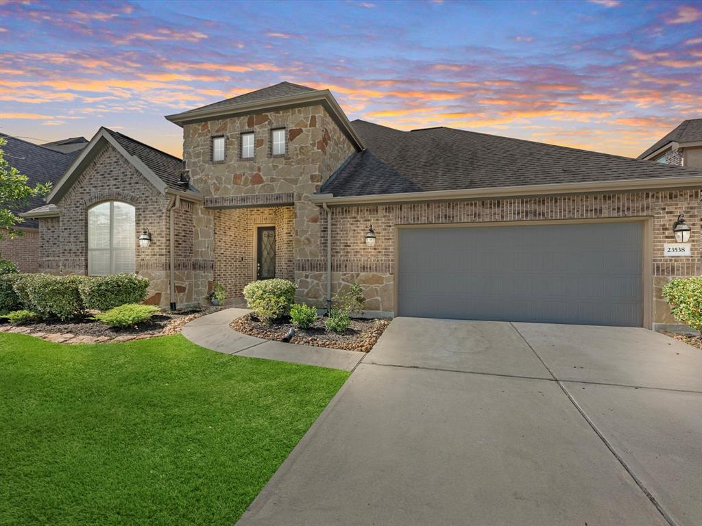 Welcome home to 23538 Vernazza Drive located in the master planned community of Tavola and zoned to New Caney ISD.