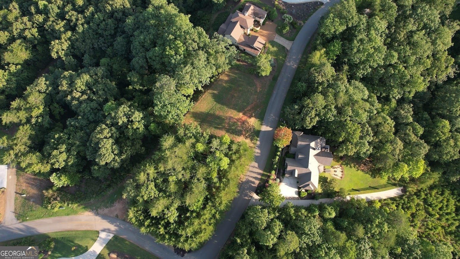 AERIAL VIEW SHOWING 1.32 ACRE CORNER LOT WITH MOUNTAIN VIEWS