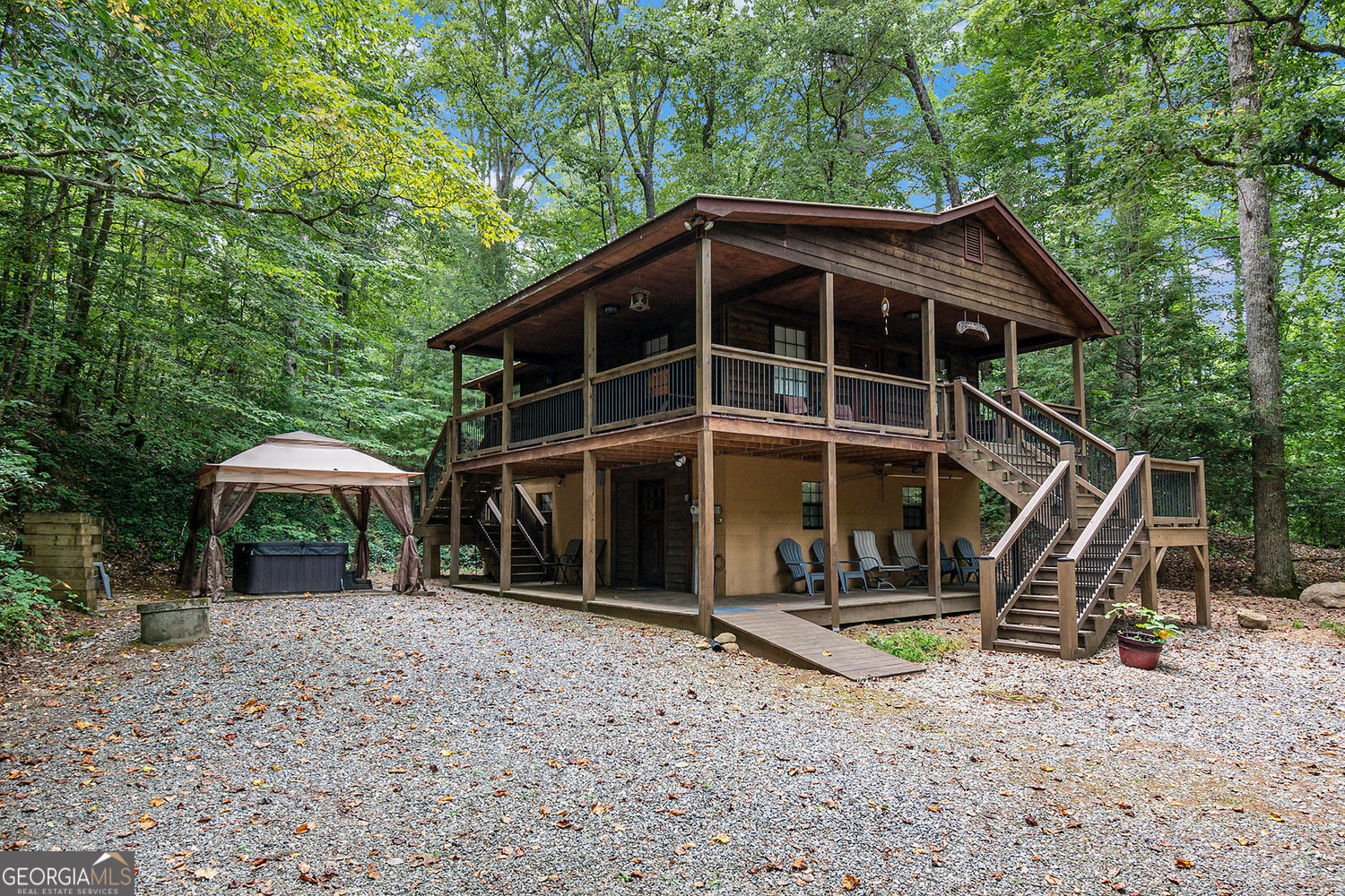 a view of a wooden deck and a yard