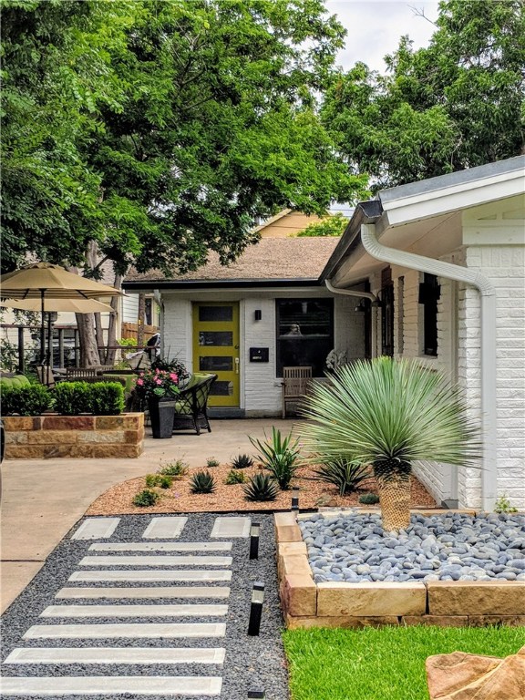 a front view of a house with porch