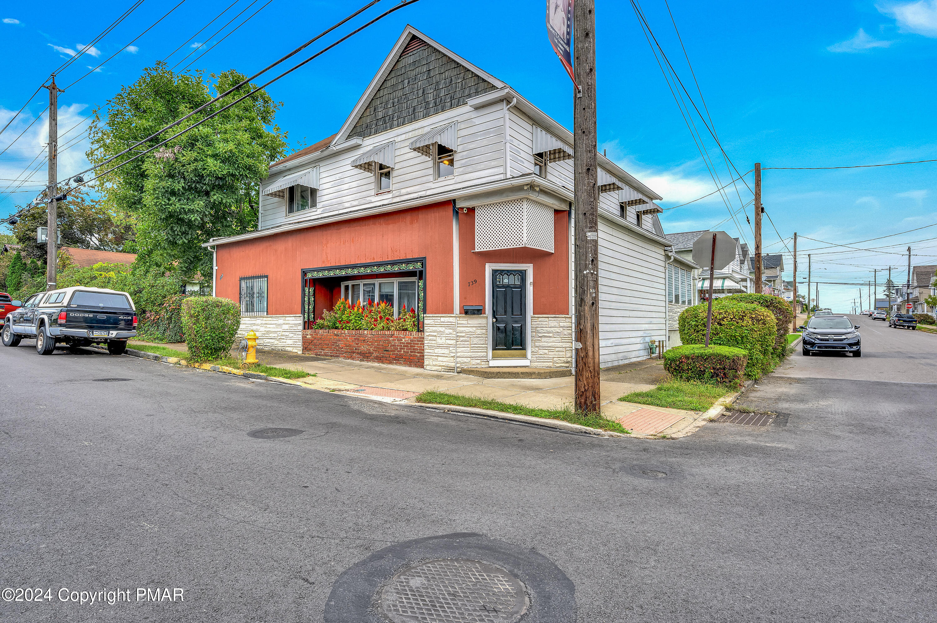 a view of a house with a street