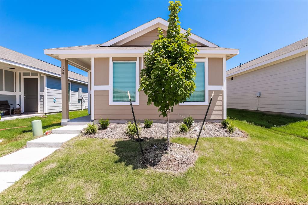 a house view with a garden space