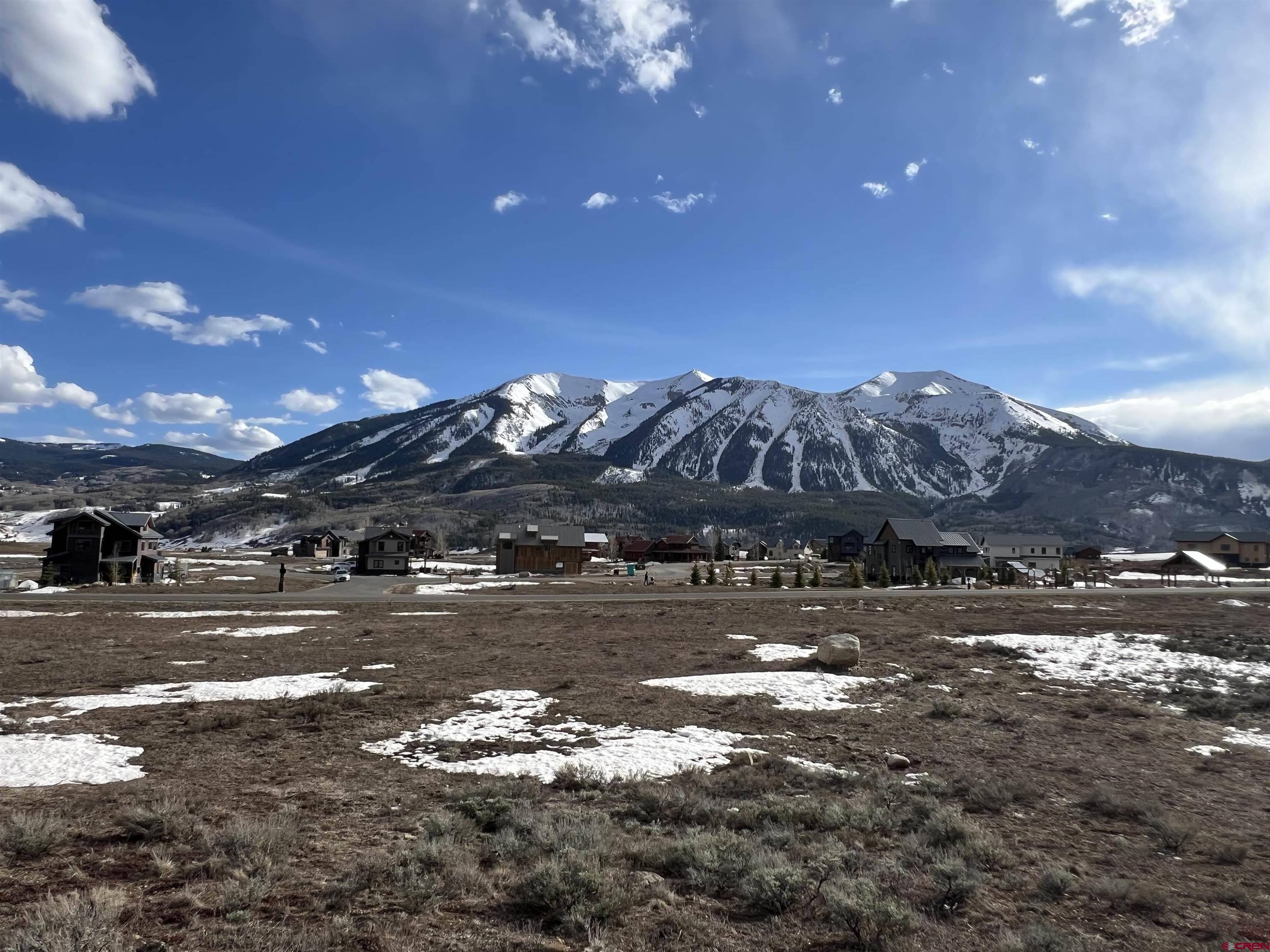 a view of a town with big yard