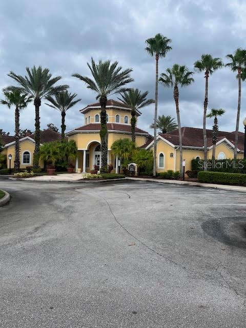 a front view of multiple houses with yard