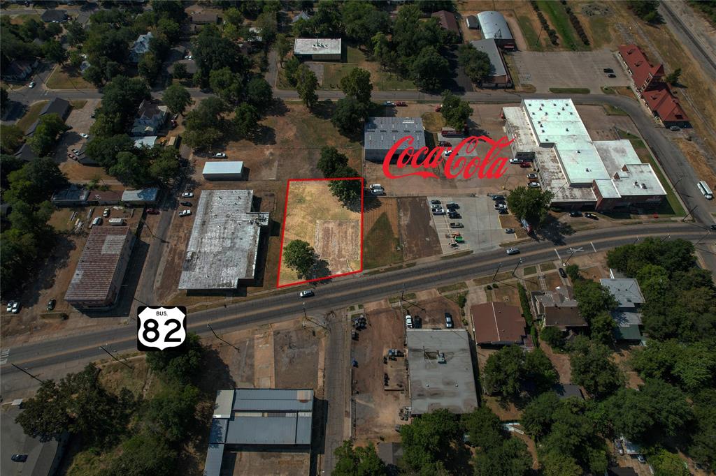 an aerial view of residential house with parking space