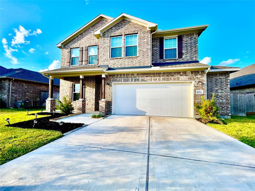 a front view of a house with swimming pool