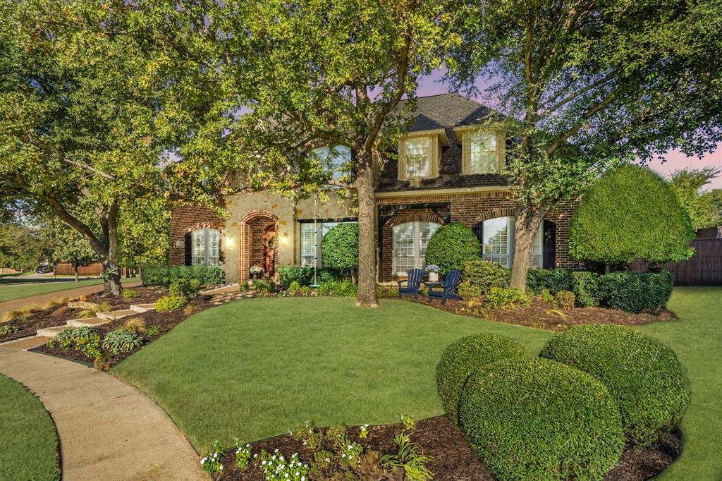 front view of a house with a big yard