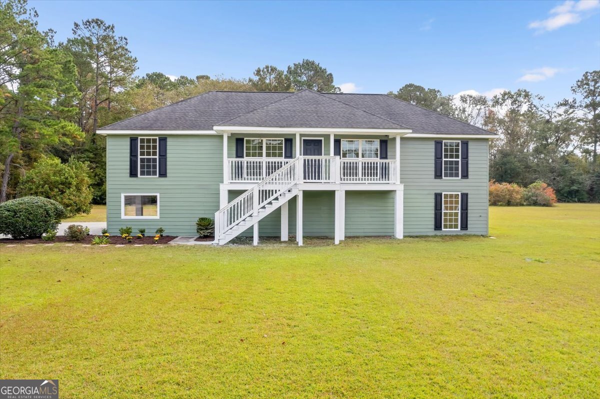 a view of a house with a ocean view