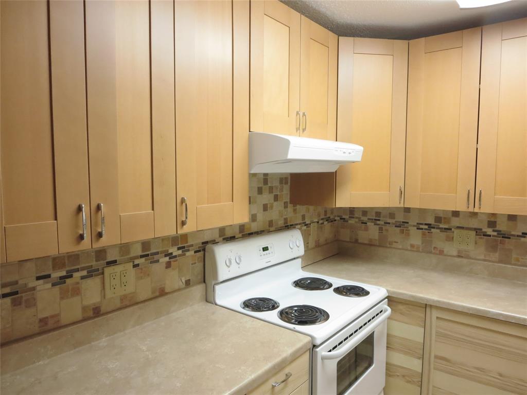 a bathroom with a sink and a washing machine