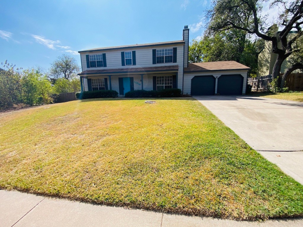 a house view with swimming pool in front of it